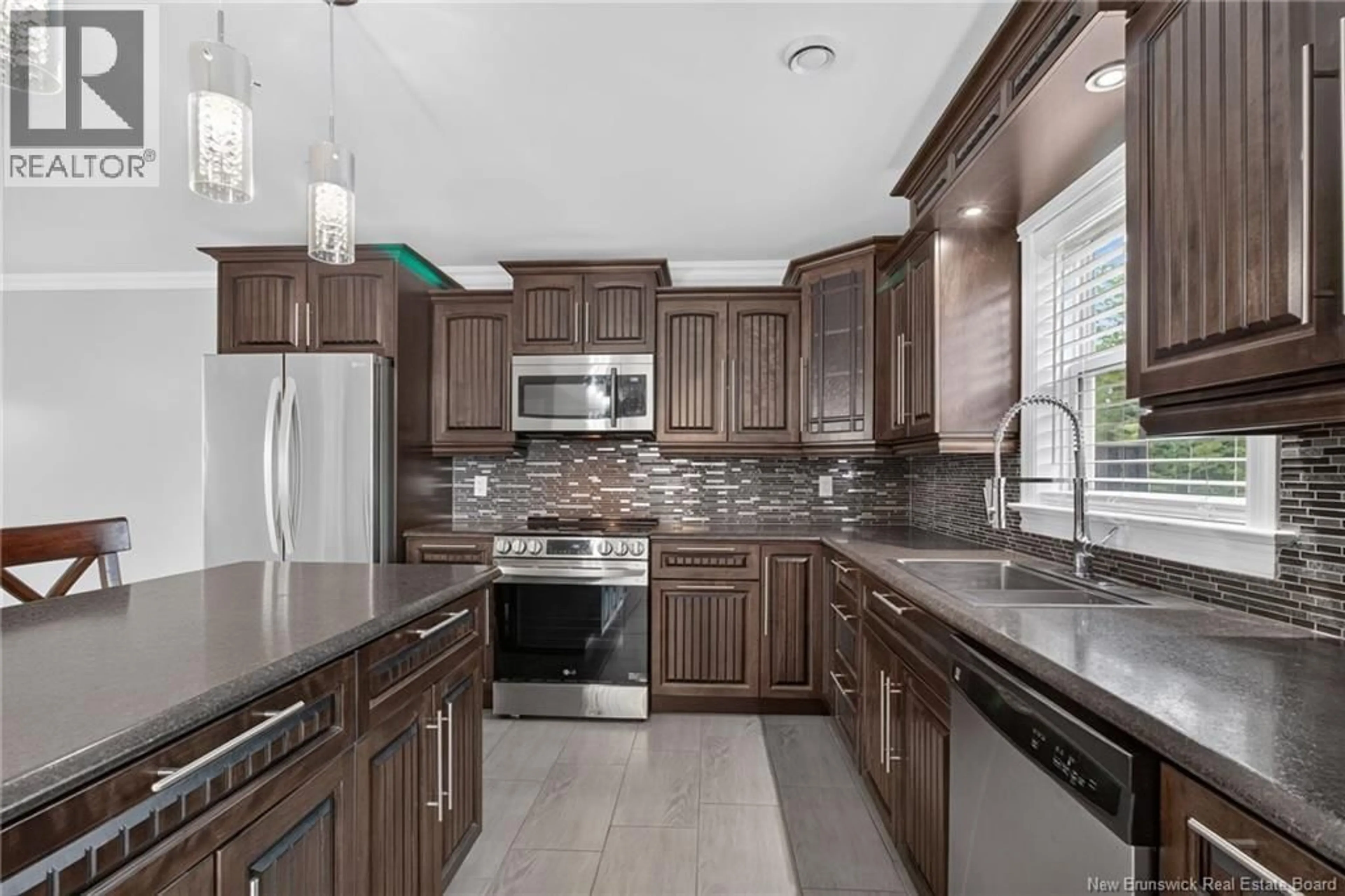 Open concept kitchen, ceramic/tile floor for 302 LADY RUSSELL, Moncton New Brunswick E1E0G1