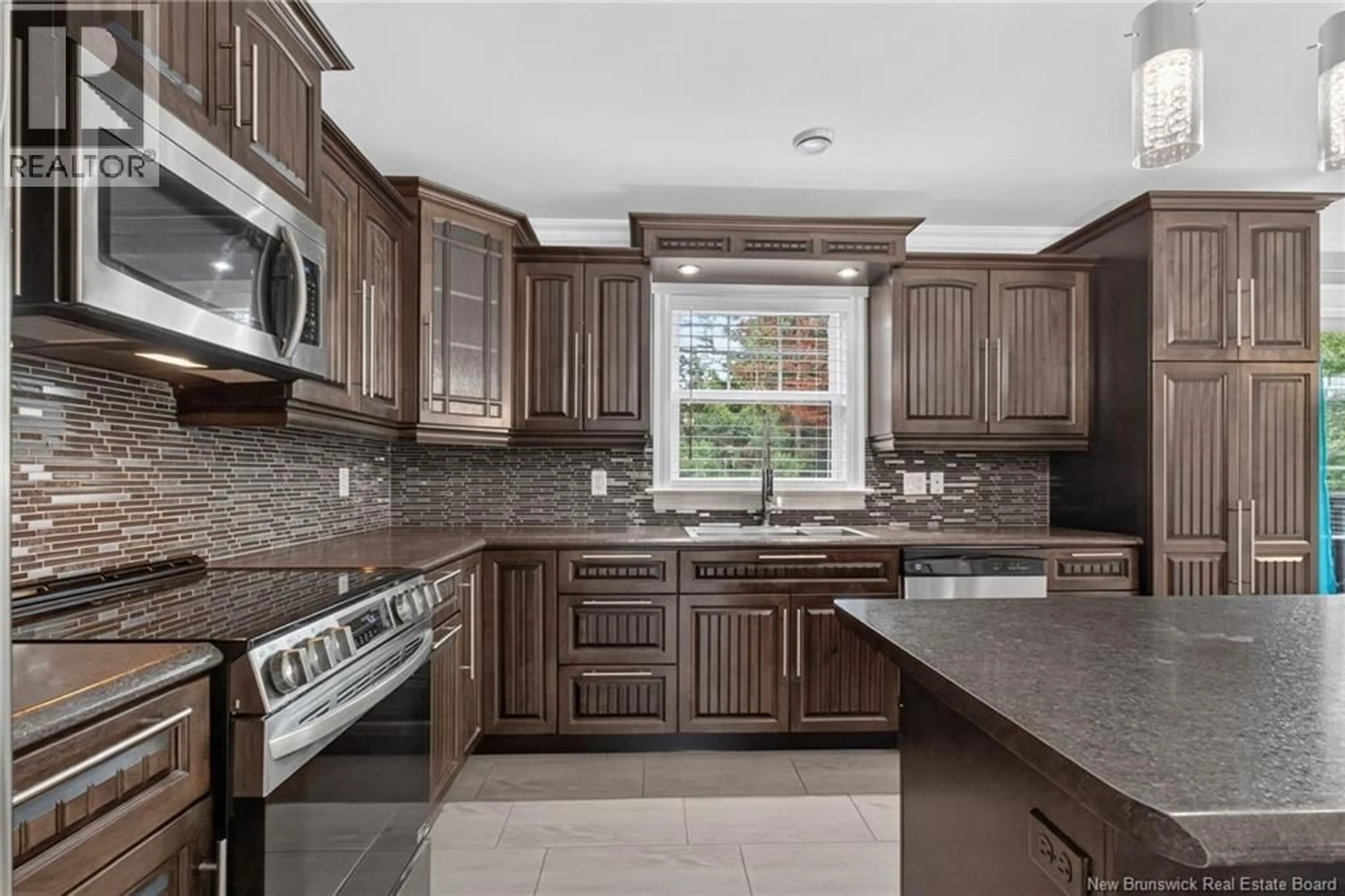 Open concept kitchen, ceramic/tile floor for 302 LADY RUSSELL, Moncton New Brunswick E1E0G1
