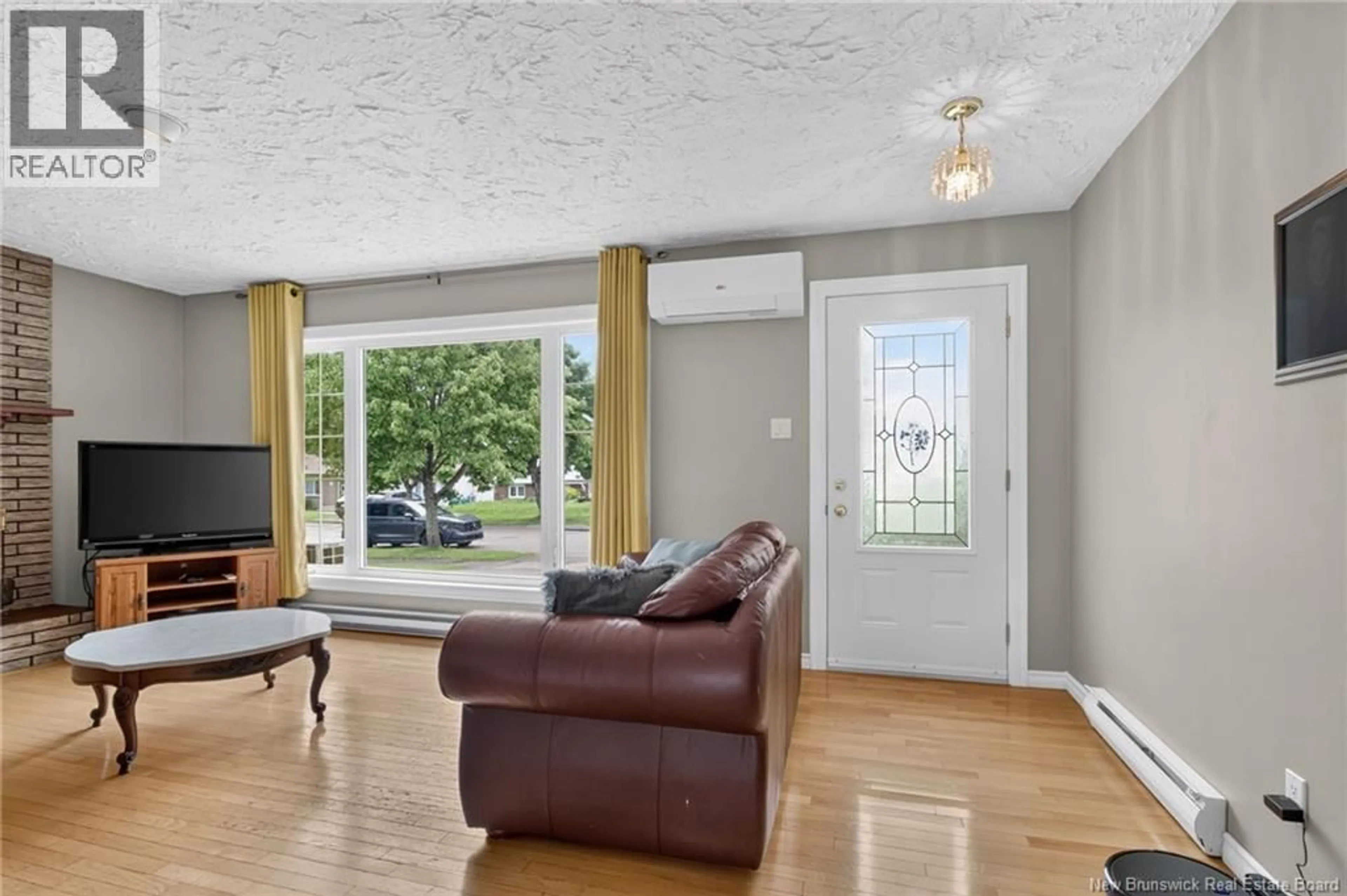 Living room with furniture, unknown for 25 LASALLE CRESCENT, Moncton New Brunswick E1A5L5