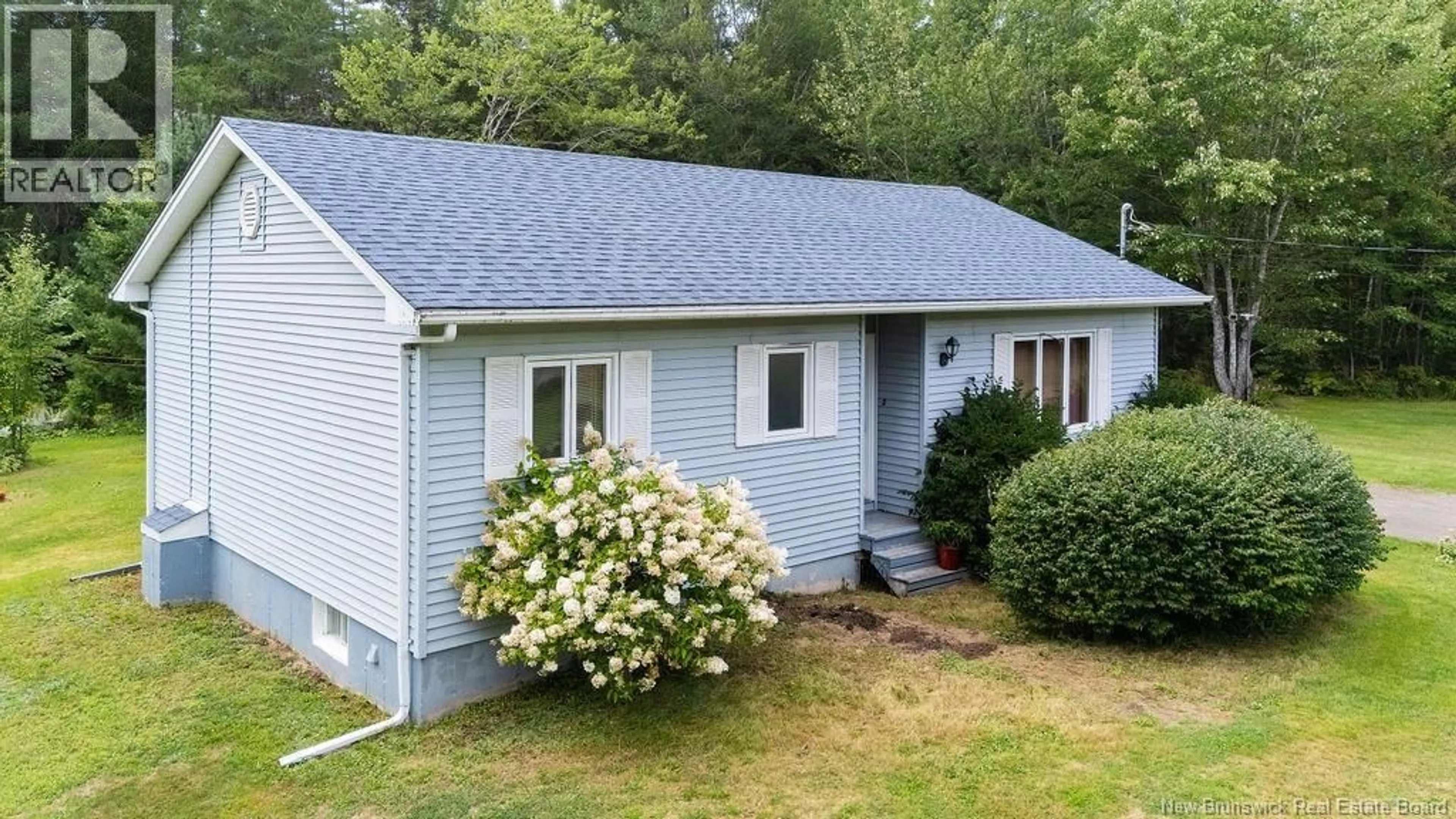 Home with vinyl exterior material, street for 96 ZACK ROAD, Berry Mills New Brunswick E1G2T9