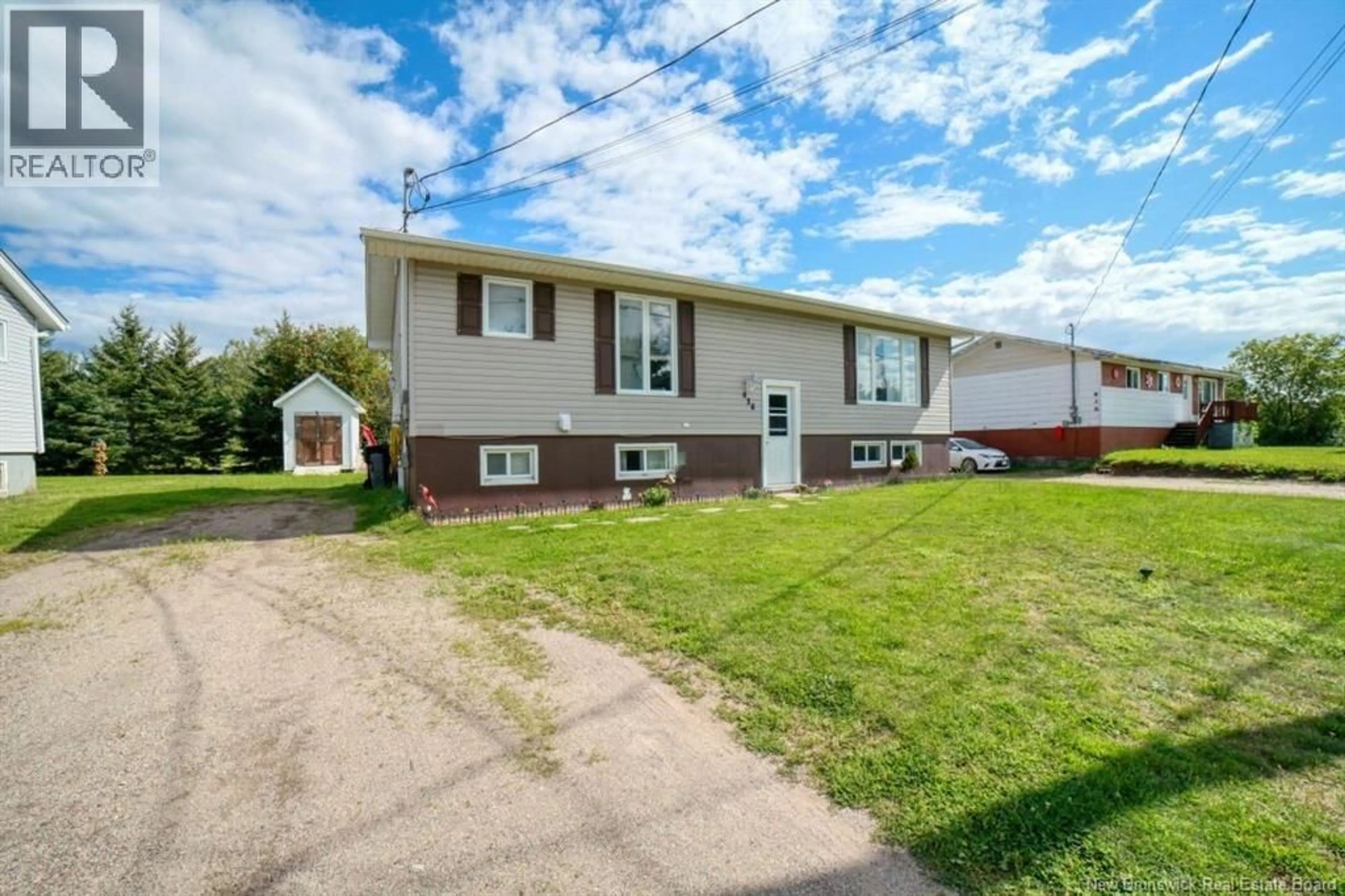 Home with vinyl exterior material, street for 838 HELEN STREET, Bathurst New Brunswick E2A2E7