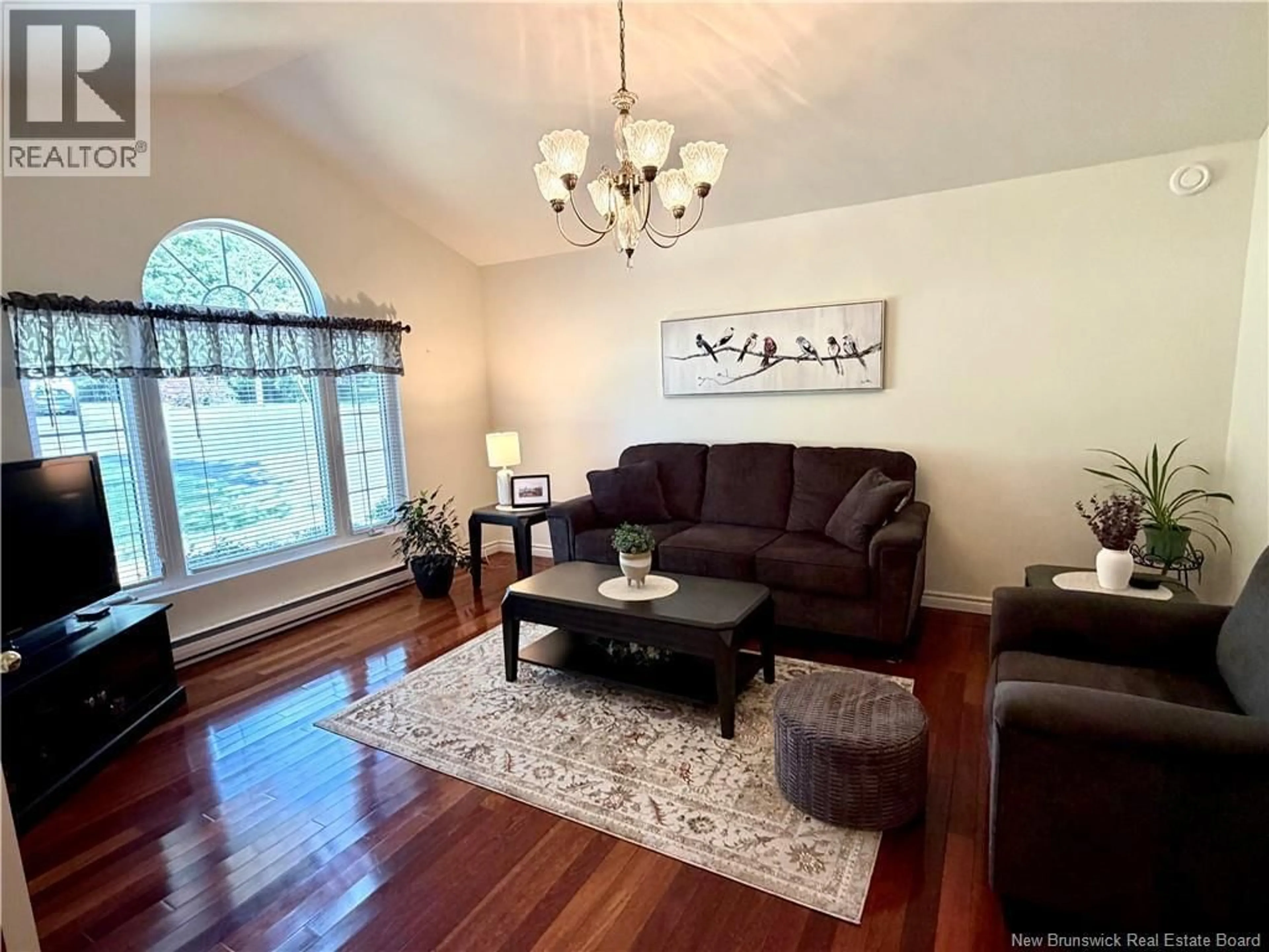 Living room with furniture, wood/laminate floor for 28 CHATWIN STREET, Rothesay New Brunswick E2S1A3