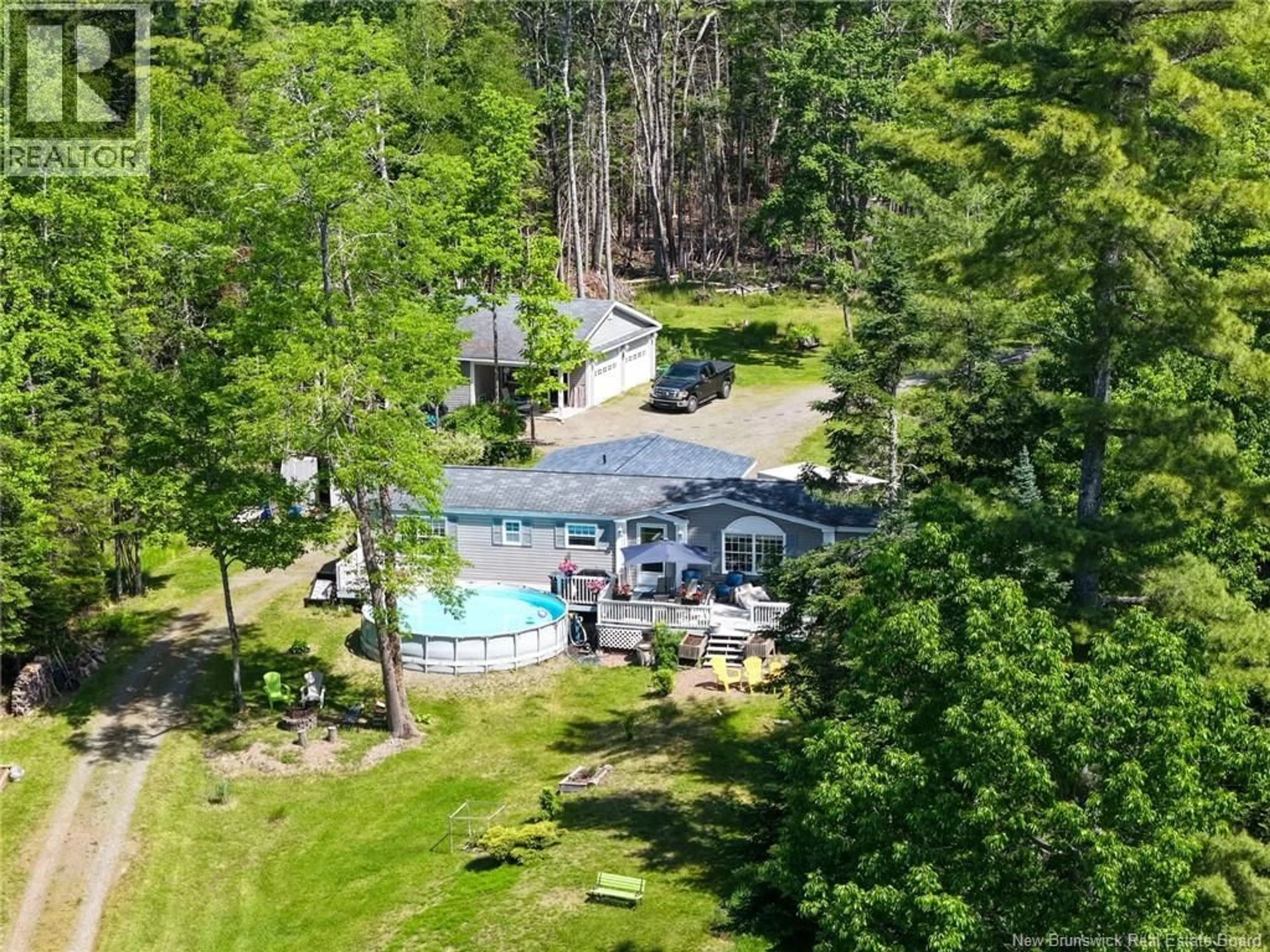 A pic from outside/outdoor area/front of a property/back of a property/a pic from drone, water/lake/river/ocean view for 12 BAYVIEW DRIVE, Dufferin New Brunswick E3L3R9