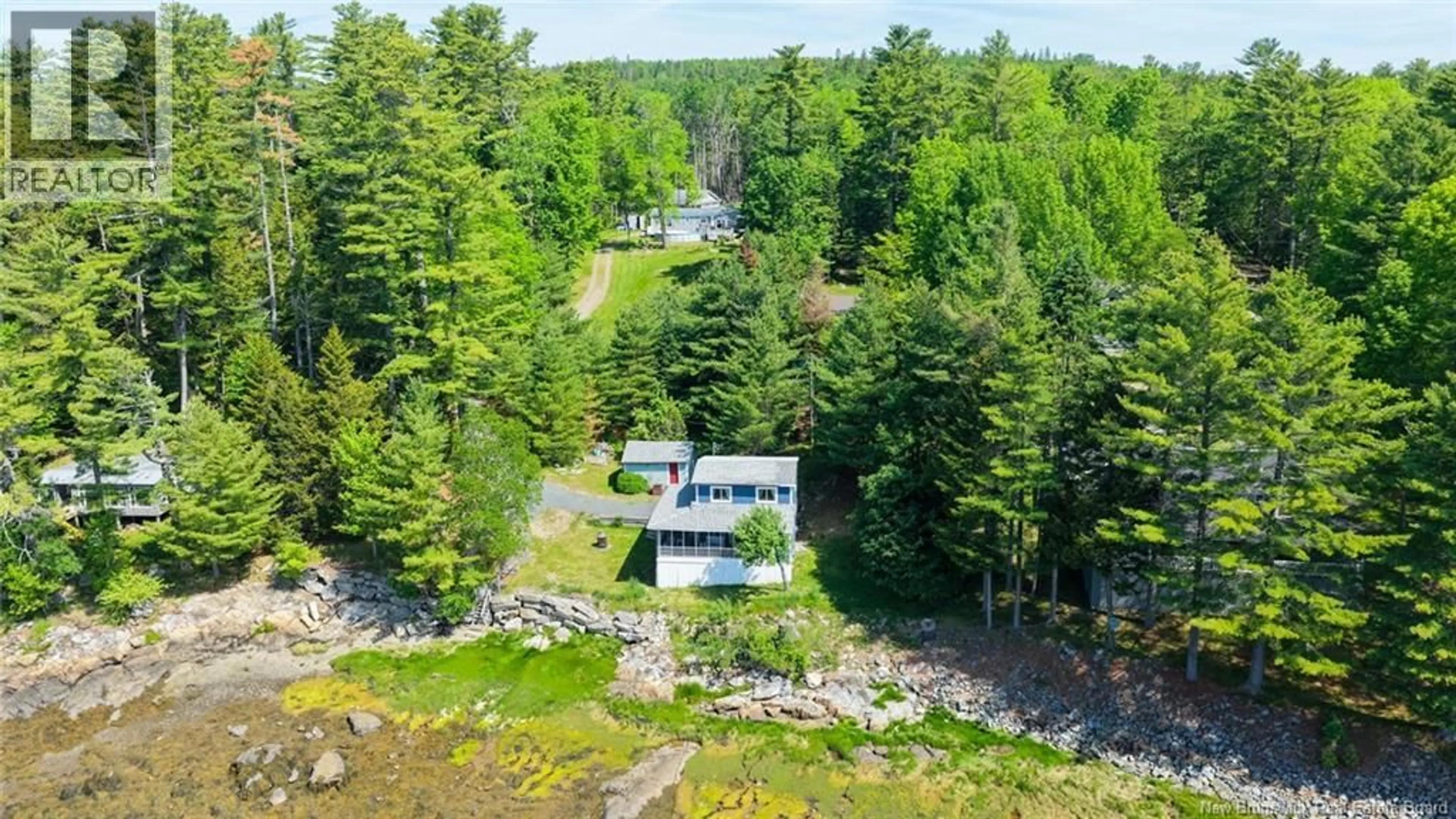 A pic from outside/outdoor area/front of a property/back of a property/a pic from drone, water/lake/river/ocean view for 12 BAYVIEW DRIVE, Dufferin New Brunswick E3L3R9