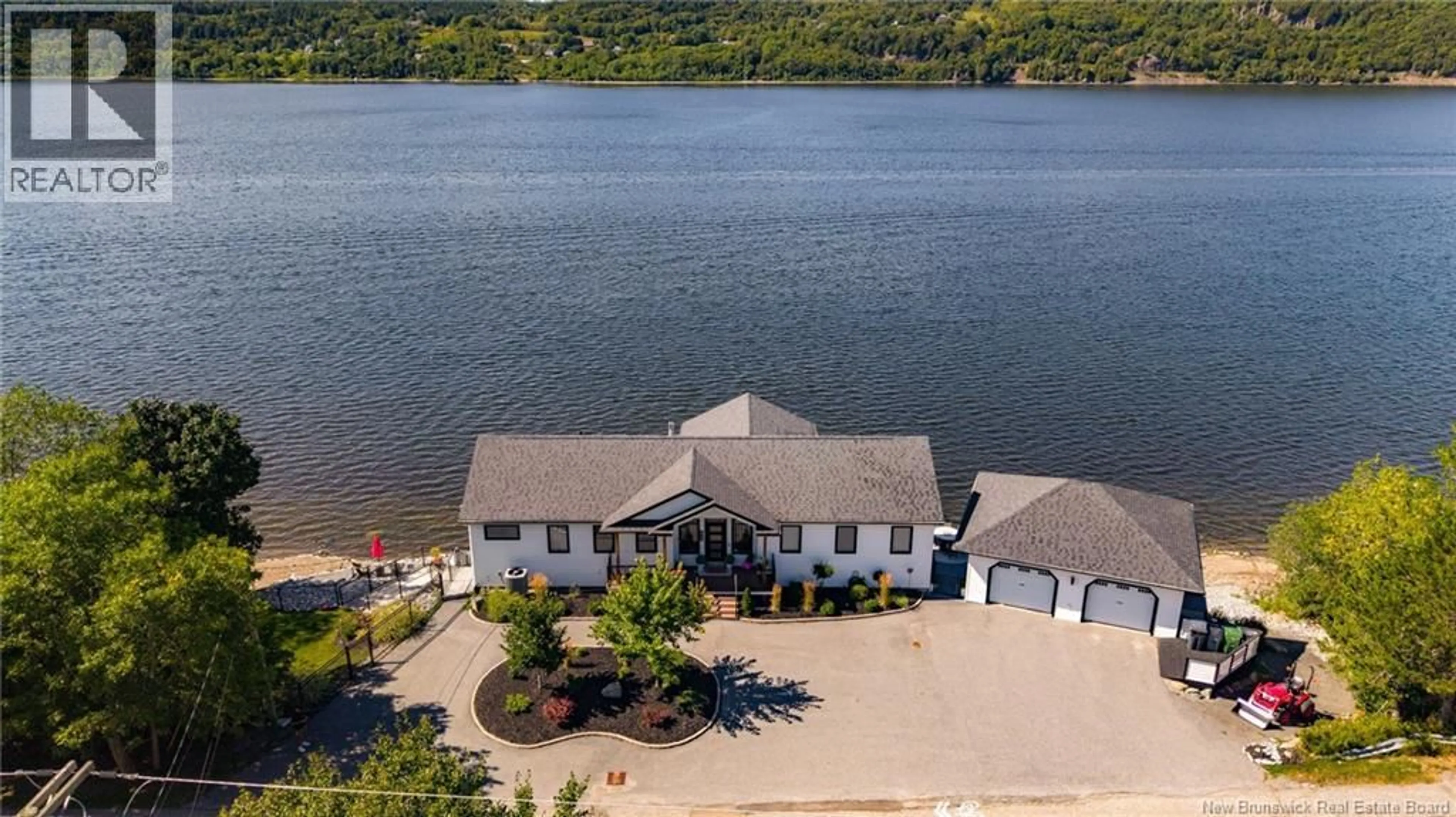 A pic from outside/outdoor area/front of a property/back of a property/a pic from drone, water/lake/river/ocean view for 615 GONDOLA POINT, Quispamsis New Brunswick E2E1K9