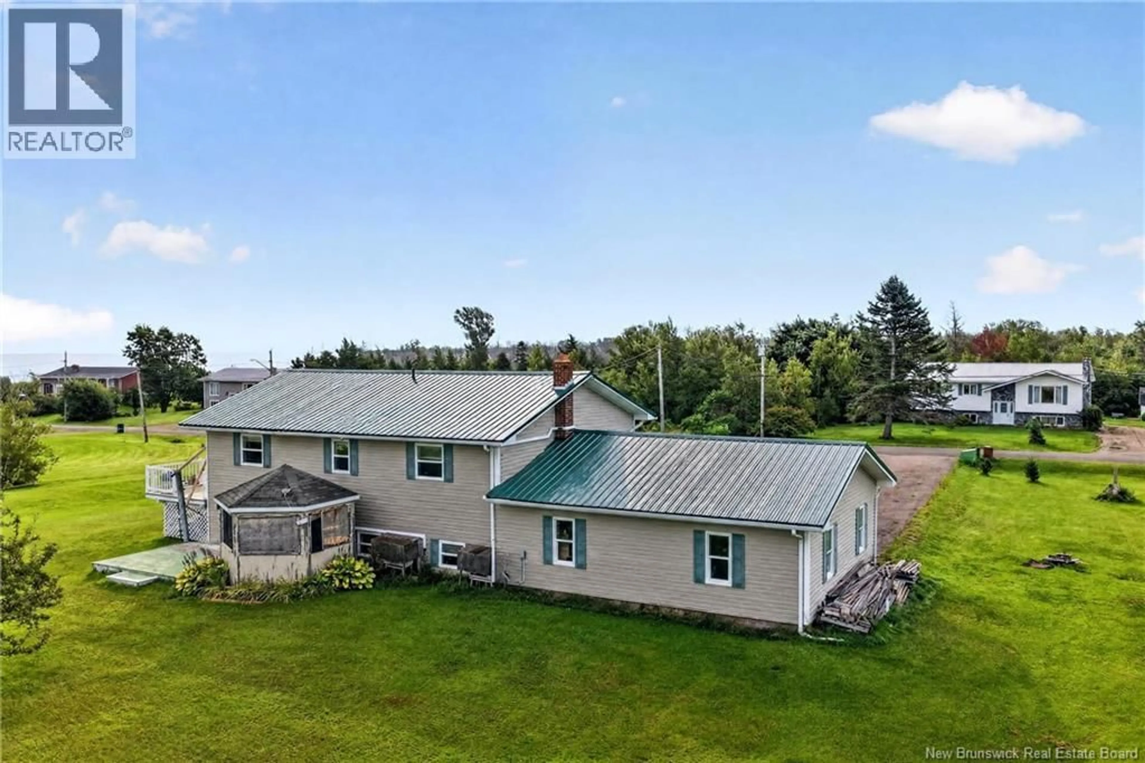 A pic from outside/outdoor area/front of a property/back of a property/a pic from drone, building for 31 BRUN STREET, Beaubassin East New Brunswick E4N2E3