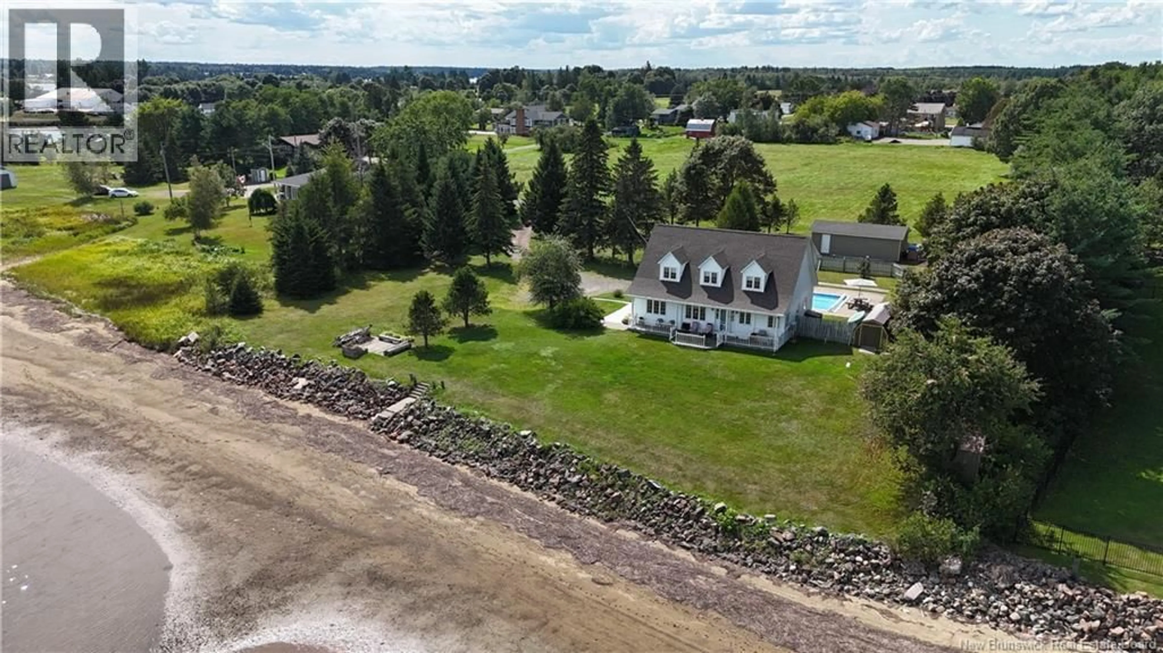 A pic from outside/outdoor area/front of a property/back of a property/a pic from drone, water/lake/river/ocean view for 13 MAPLE DRIVE, Rexton New Brunswick E4W2B8