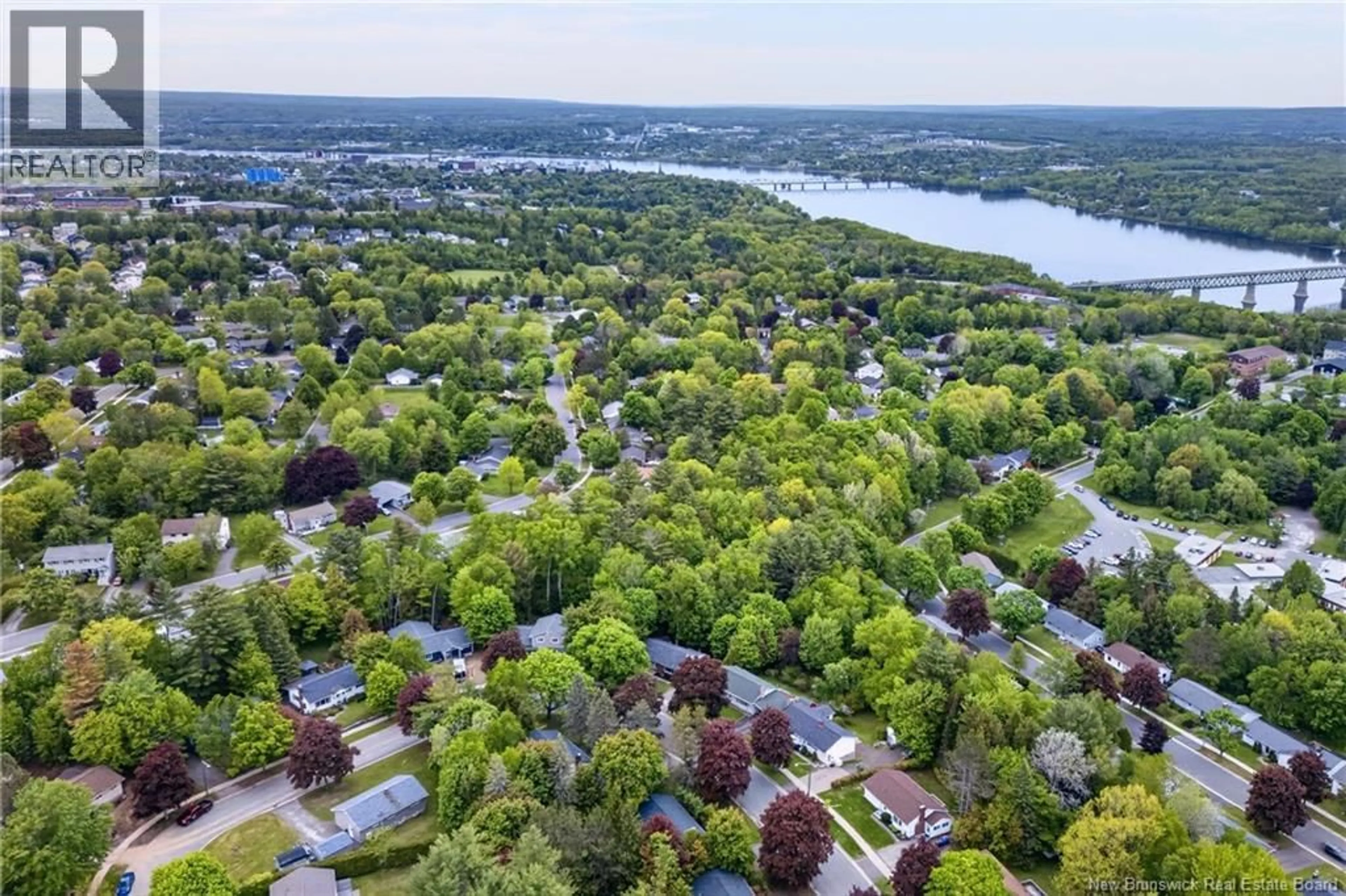 A pic from outside/outdoor area/front of a property/back of a property/a pic from drone, water/lake/river/ocean view for 132 TOPCLIFFE CRESCENT, Fredericton New Brunswick E3B4P9