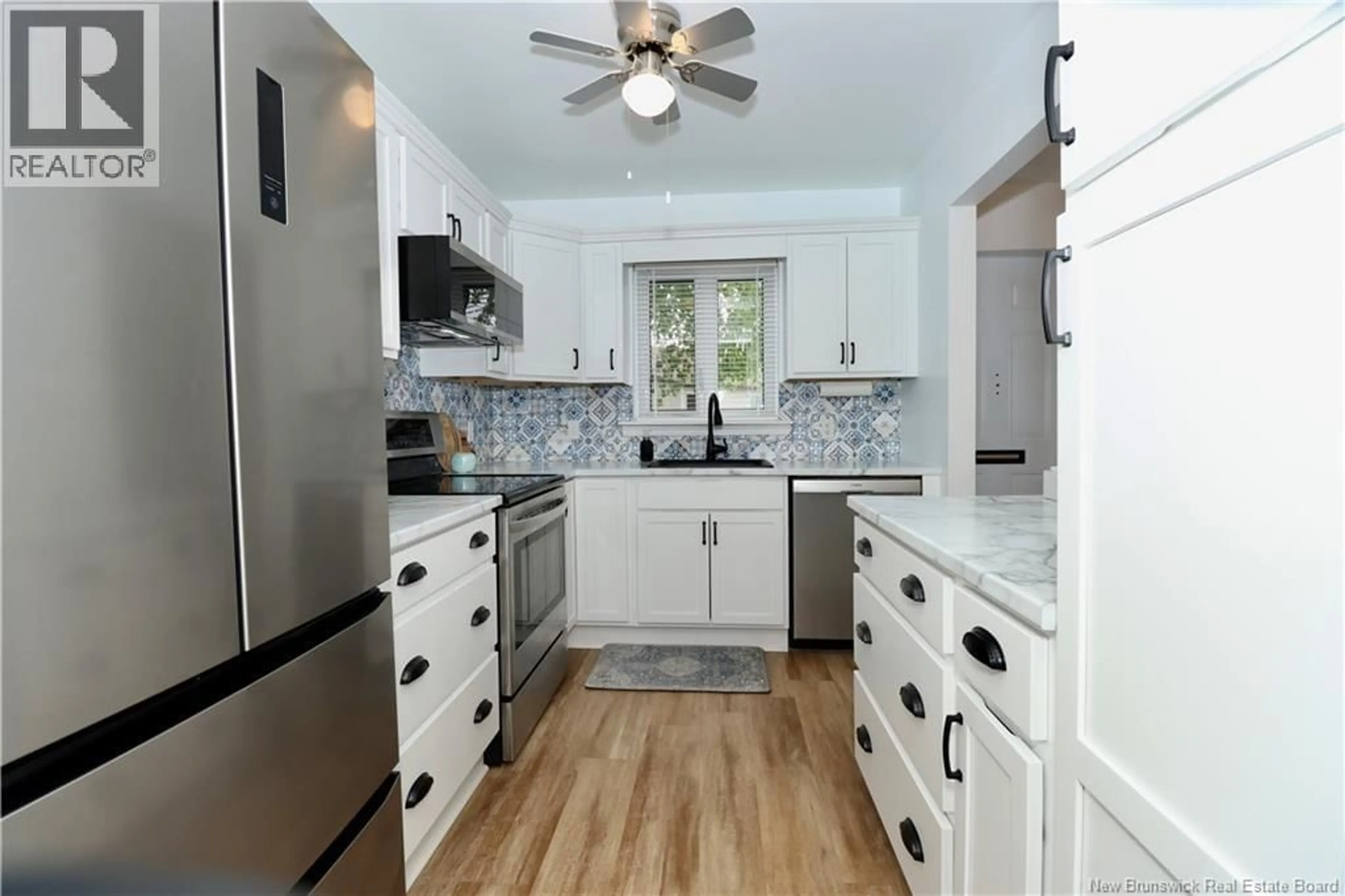 Open concept kitchen, ceramic/tile floor for 5 - 84 SEAMAN STREET, Moncton New Brunswick E1A4B6