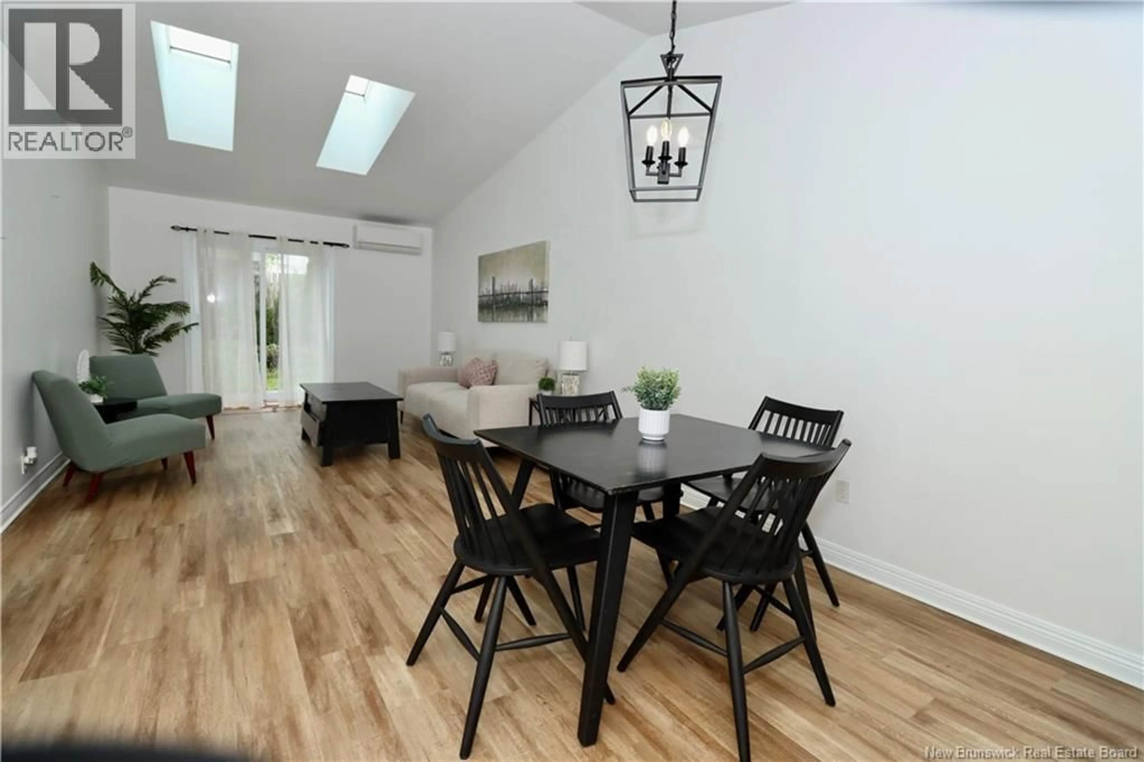 Dining room, wood/laminate floor for 5 - 84 SEAMAN STREET, Moncton New Brunswick E1A4B6