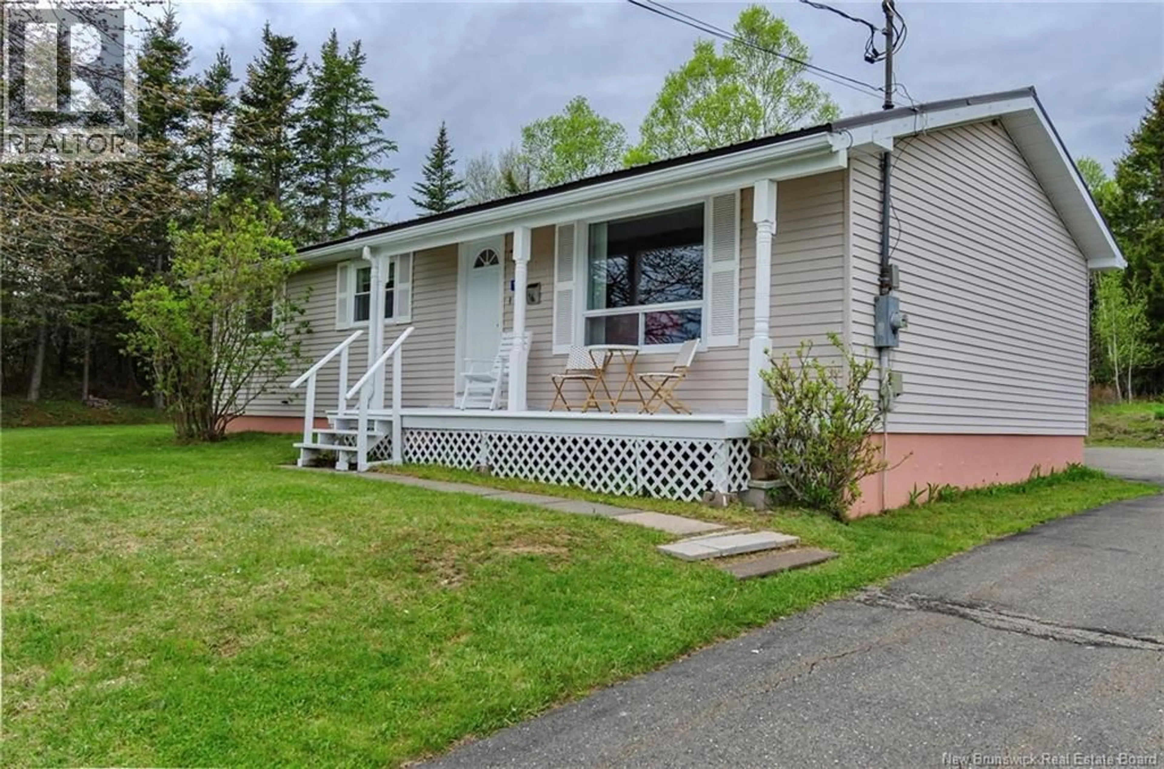 Home with vinyl exterior material, street for 16 ARMSTRONG CRESCENT, St George New Brunswick E5C1A1