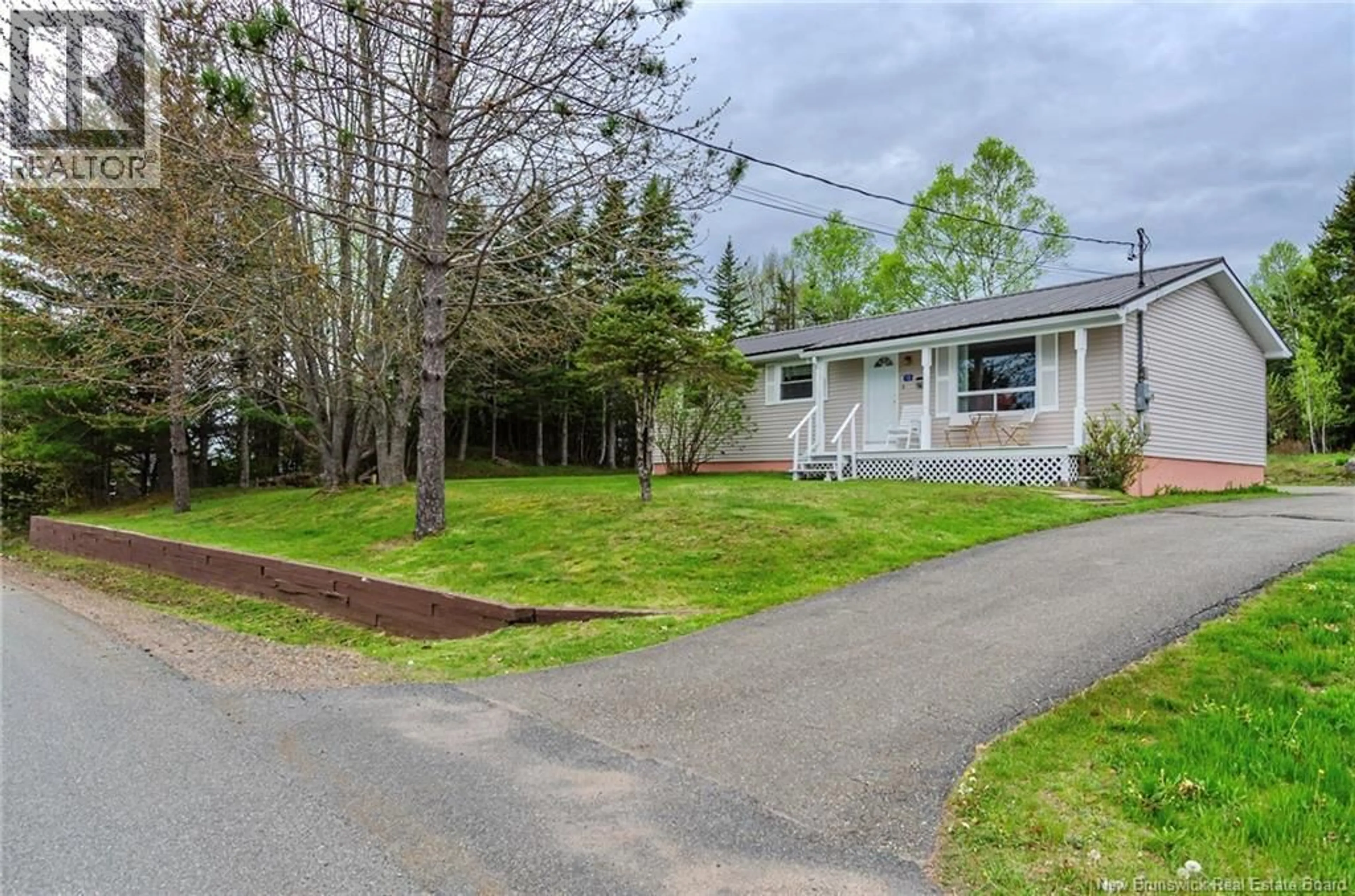 A pic from outside/outdoor area/front of a property/back of a property/a pic from drone, street for 16 ARMSTRONG CRESCENT, St George New Brunswick E5C1A1