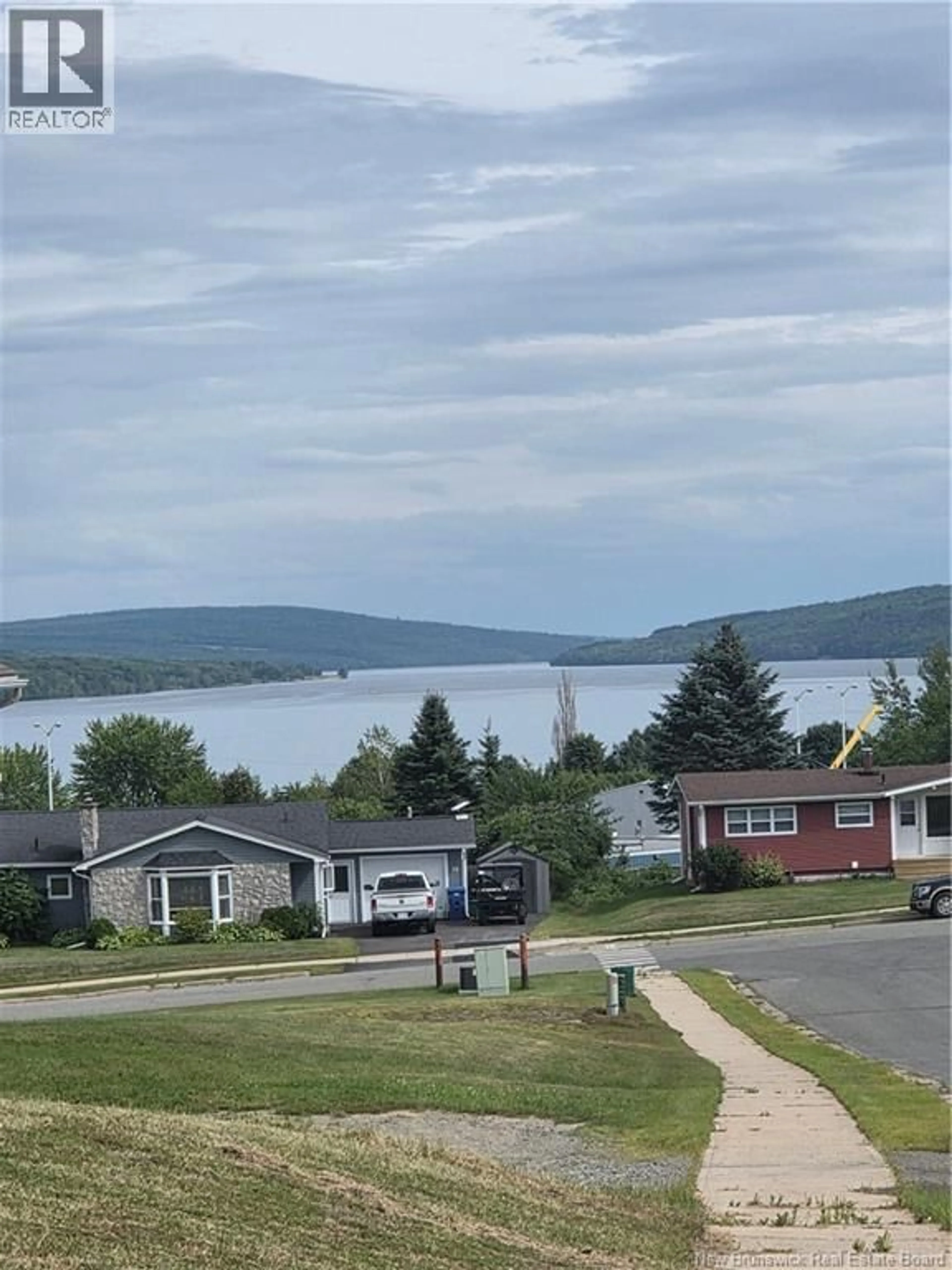 A pic from outside/outdoor area/front of a property/back of a property/a pic from drone, water/lake/river/ocean view for 22 TODD ST, Nackawic New Brunswick E6G1B8
