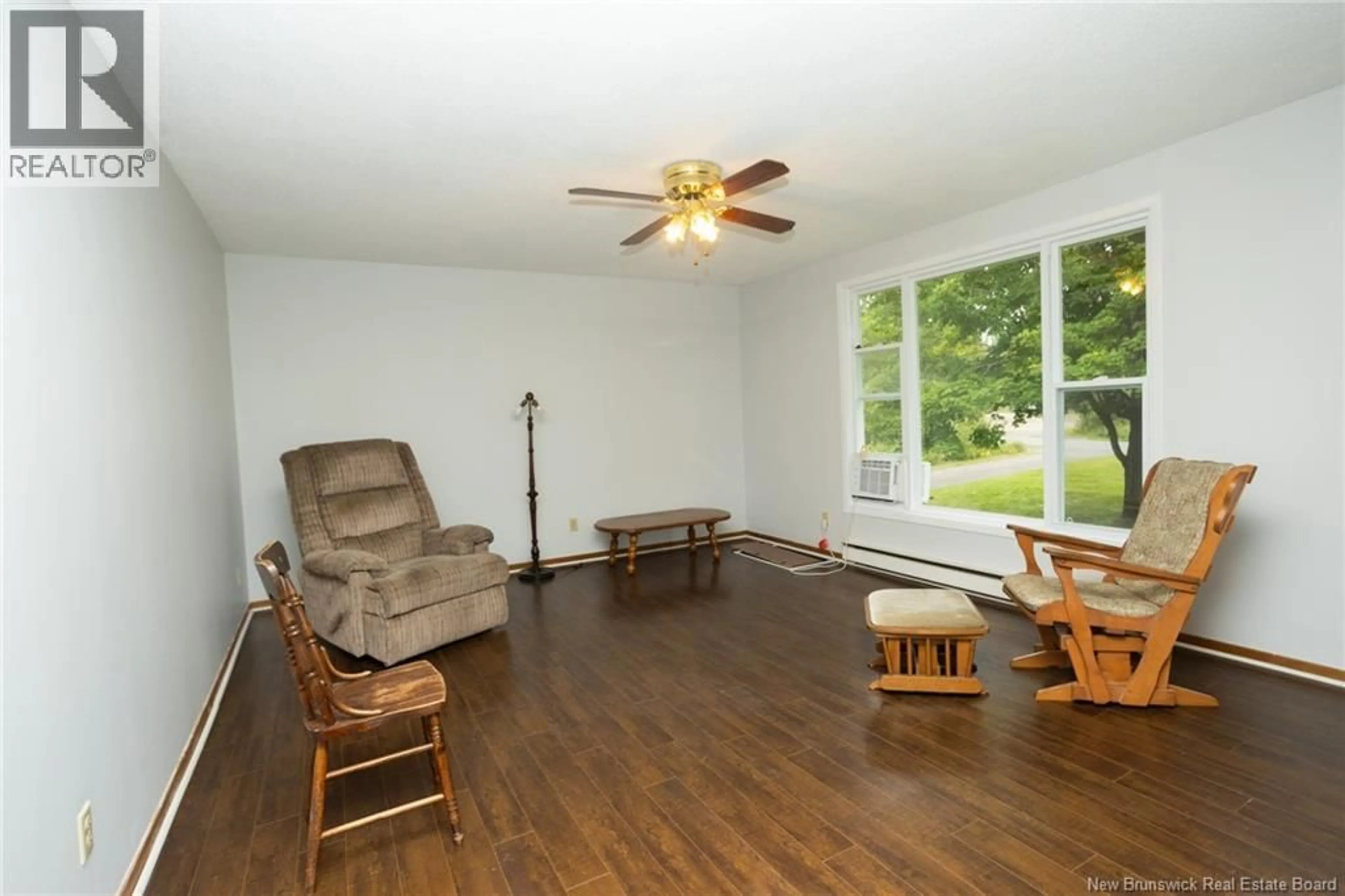 Living room with furniture, wood/laminate floor for 9 LUDFORD LANE, Mazerolle Settlement New Brunswick E3E1Z4