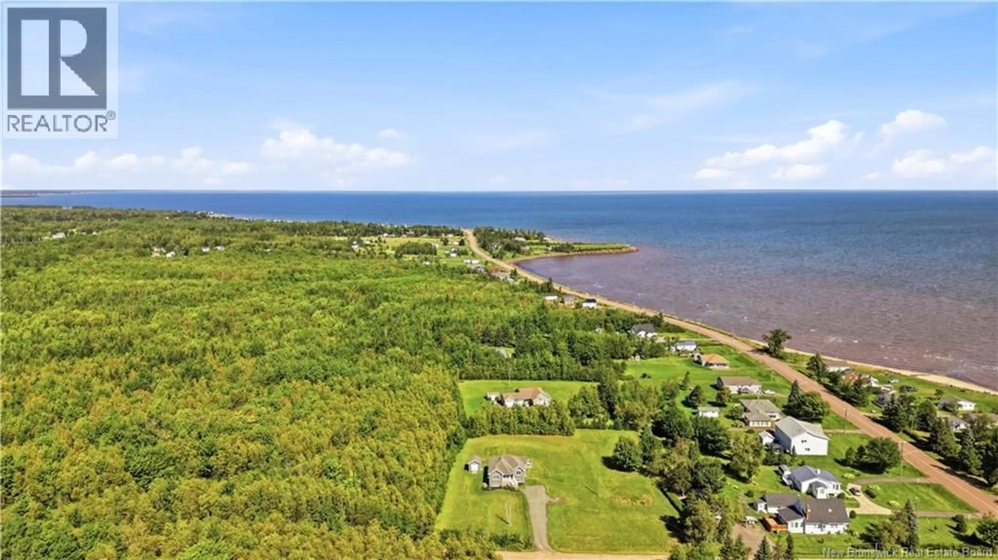 A pic from outside/outdoor area/front of a property/back of a property/a pic from drone, water/lake/river/ocean view for 30 MERLOT LANE, Grande-Digue New Brunswick E4R0A9