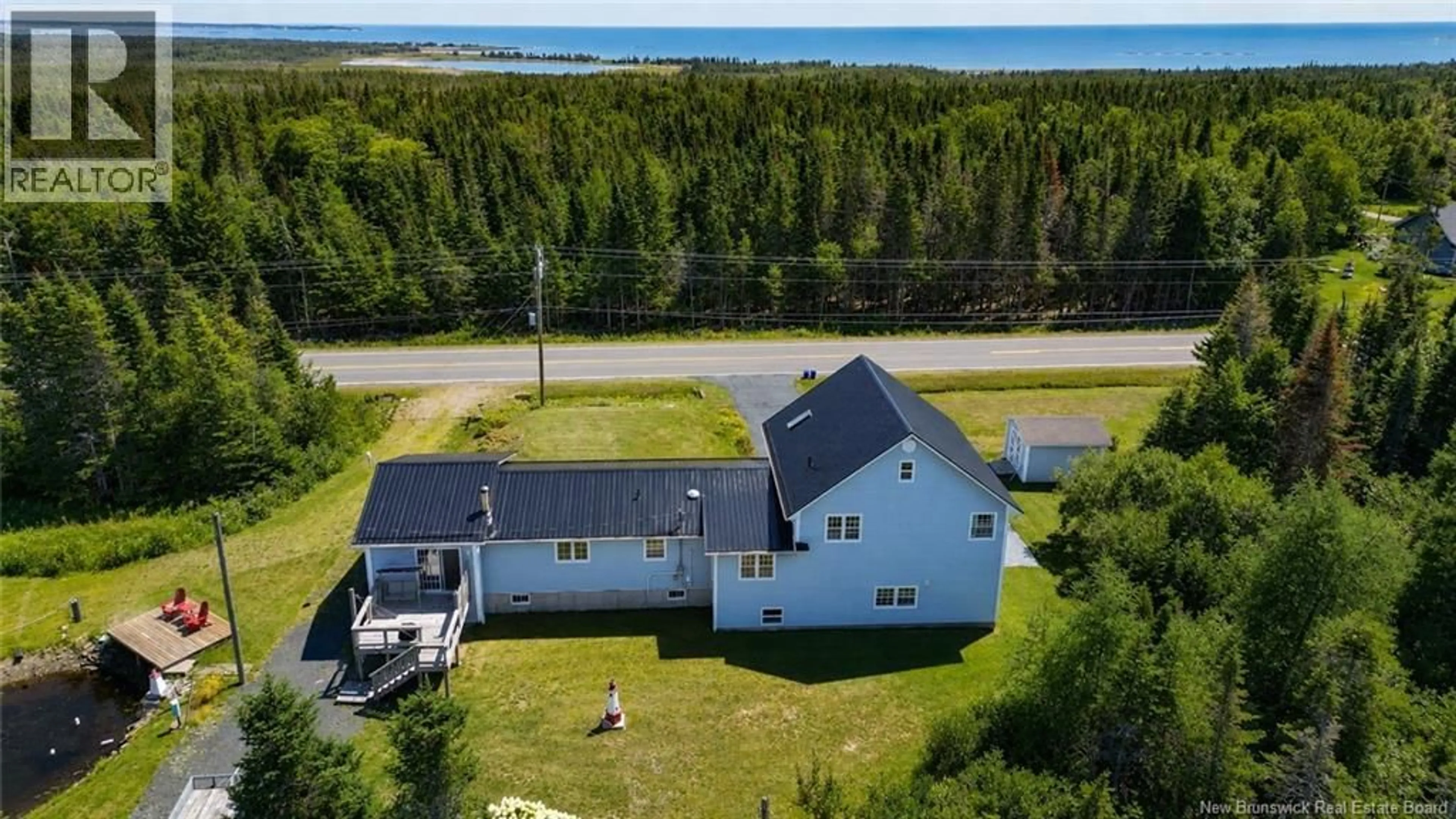 A pic from outside/outdoor area/front of a property/back of a property/a pic from drone, water/lake/river/ocean view for 1432 ROUTE 776, Grand Manan New Brunswick E5G1H6