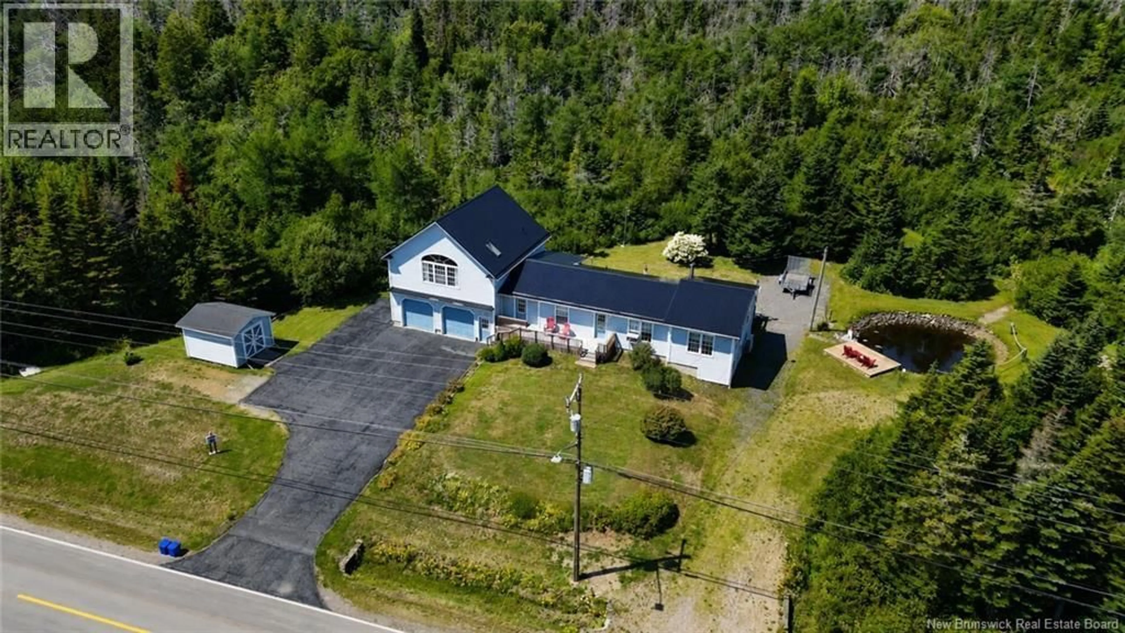 A pic from outside/outdoor area/front of a property/back of a property/a pic from drone, street for 1432 ROUTE 776, Grand Manan New Brunswick E5G1H6