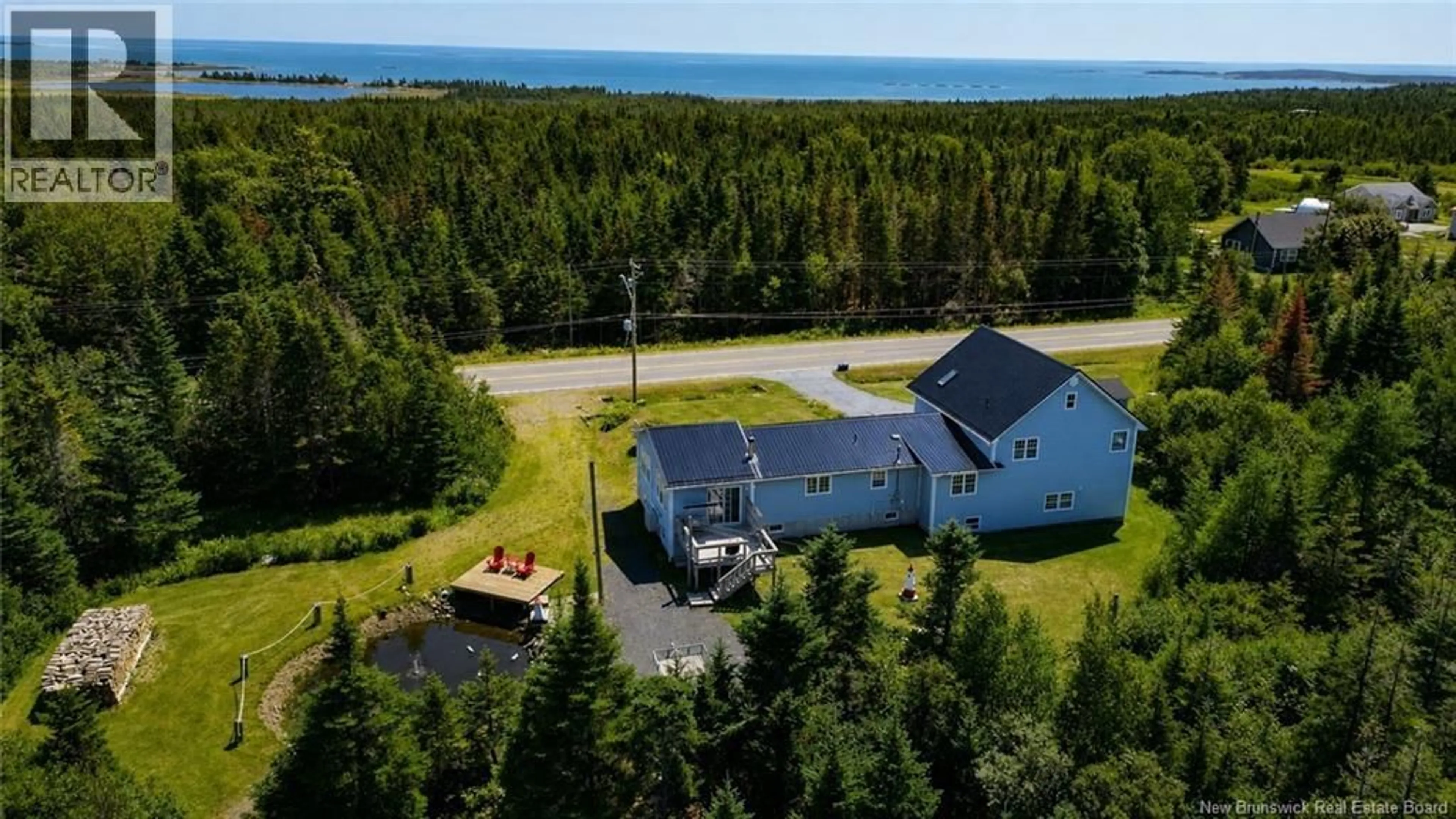 A pic from outside/outdoor area/front of a property/back of a property/a pic from drone, water/lake/river/ocean view for 1432 ROUTE 776, Grand Manan New Brunswick E5G1H6