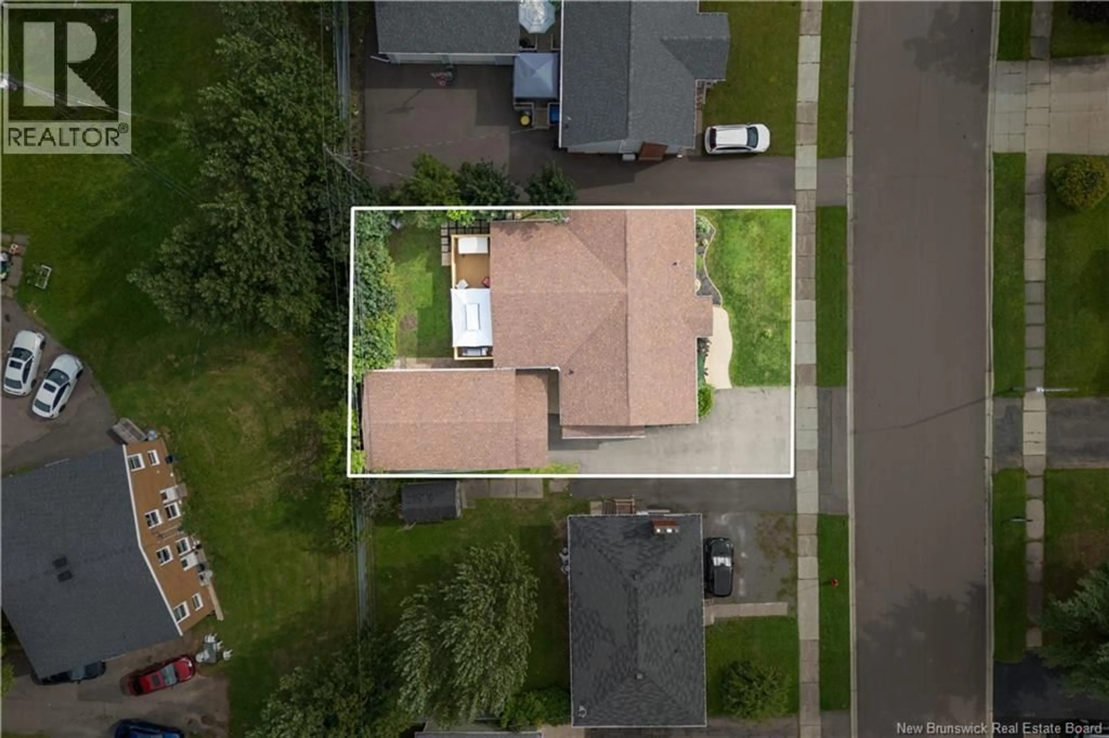 A pic from outside/outdoor area/front of a property/back of a property/a pic from drone, street for 79 POIRIER DRIVE, Moncton New Brunswick E1C7R9