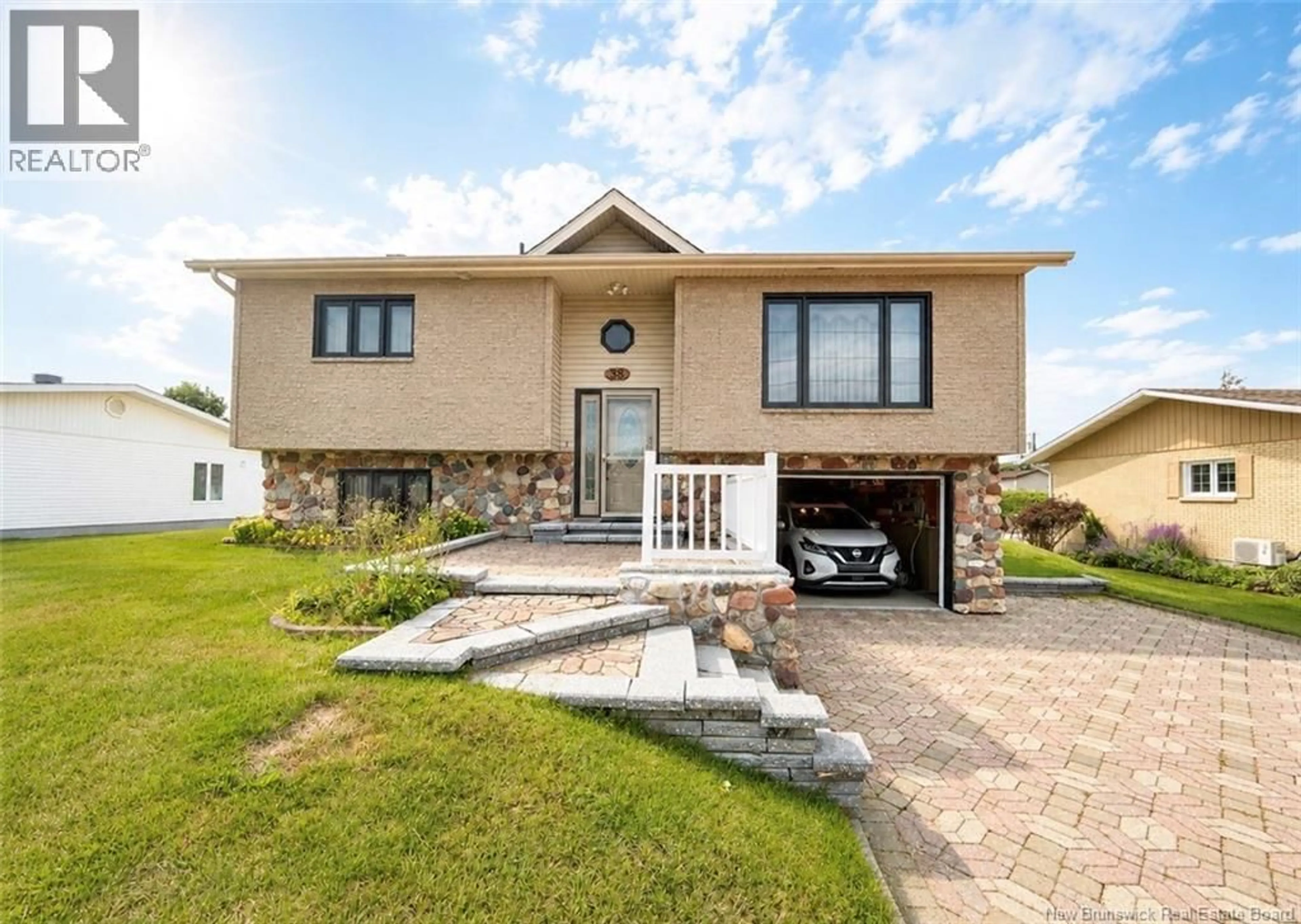 Home with vinyl exterior material, street for 38 OUELLETTE STREET, Saint-Jacques New Brunswick E7B1M9