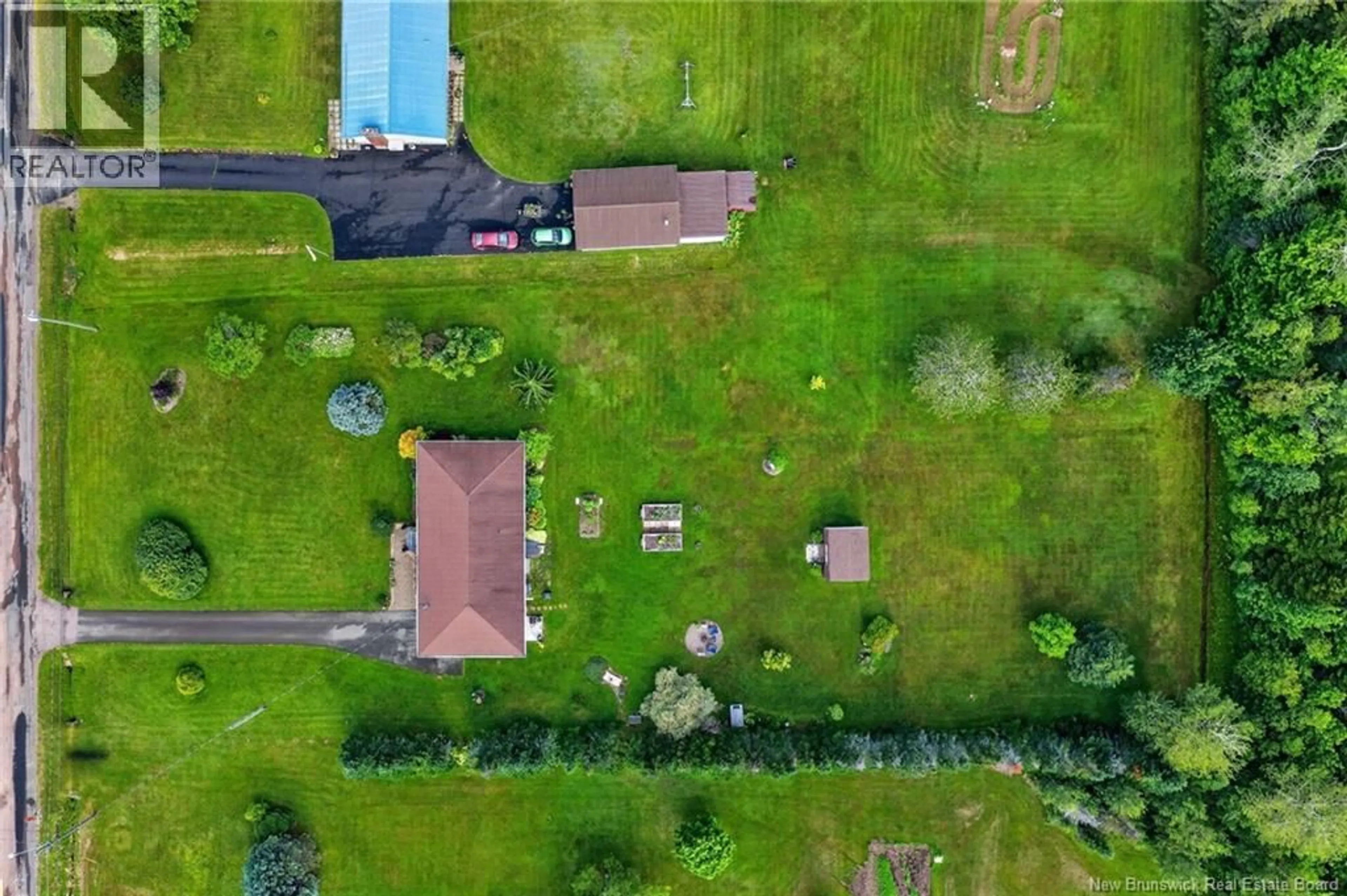 A pic from outside/outdoor area/front of a property/back of a property/a pic from drone, building for 232 BABINEAU ROAD, Grande-Digue New Brunswick E4R3T9