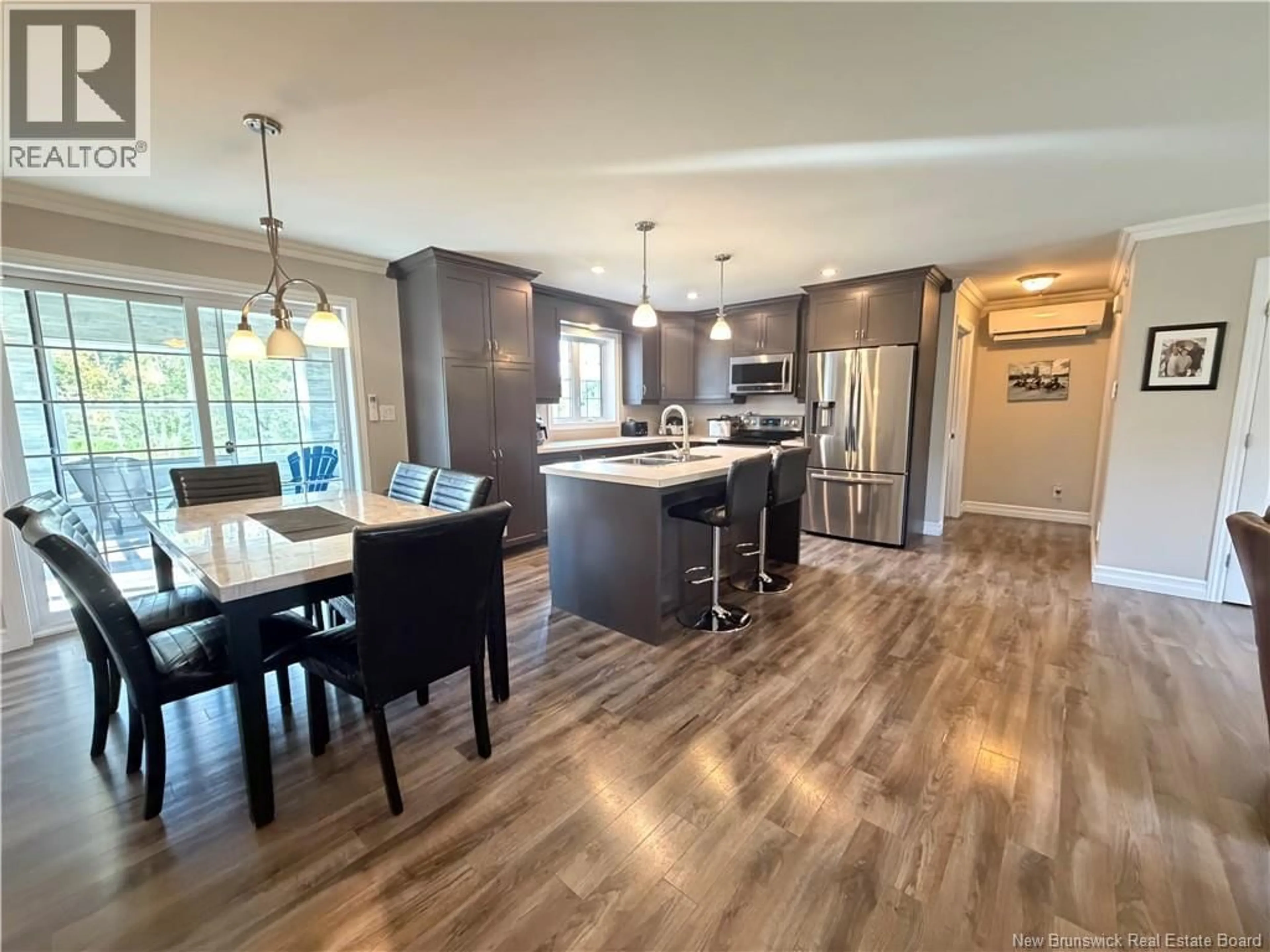 Open concept kitchen, wood/laminate floor for 5712 ROUTE 17, Saint-Quentin New Brunswick E8A2J1