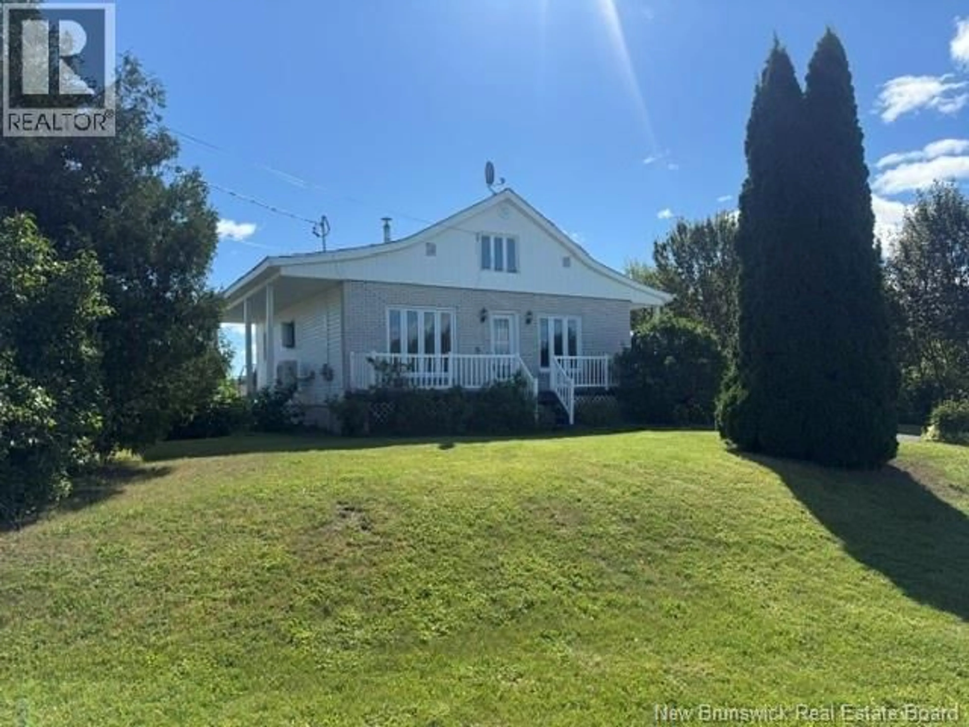 A pic from outside/outdoor area/front of a property/back of a property/a pic from drone, water/lake/river/ocean view for 18 SAVOIE STREET, Eel River Crossing New Brunswick E8E1T8