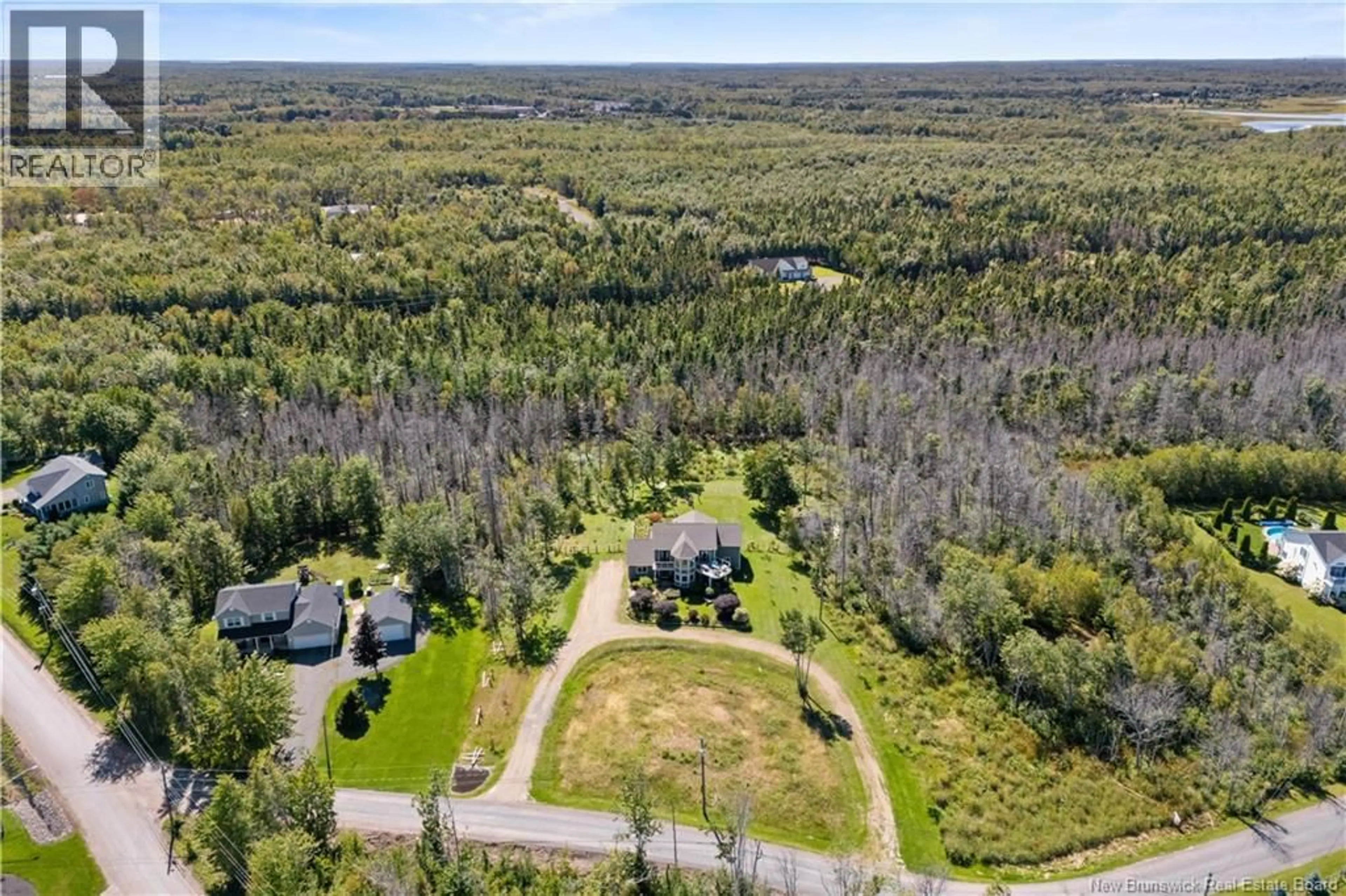 A pic from outside/outdoor area/front of a property/back of a property/a pic from drone, water/lake/river/ocean view for 8 OCEAN BREEZE DRIVE, Grand-Barachois New Brunswick E4P7X2
