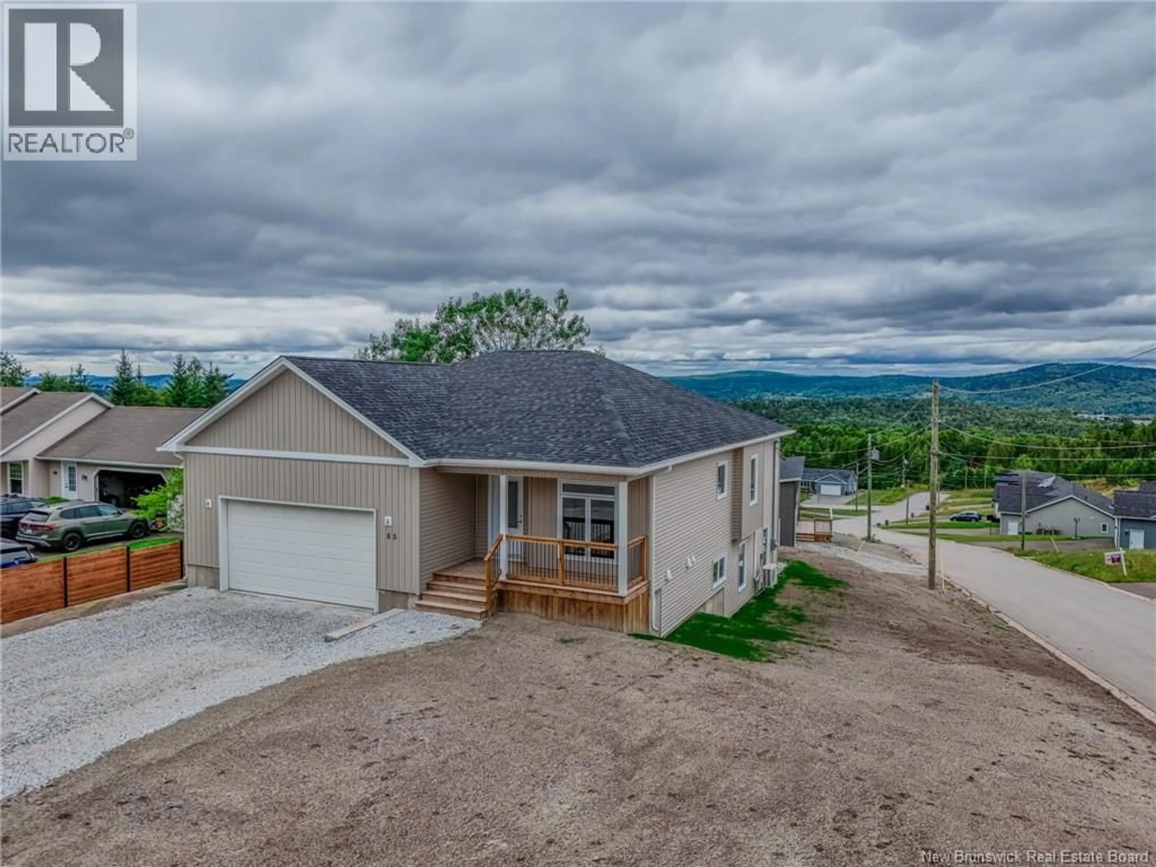 A pic from outside/outdoor area/front of a property/back of a property/a pic from drone, unknown for 65 SQUIRE DRIVE, Quispamsis New Brunswick E2G1C1