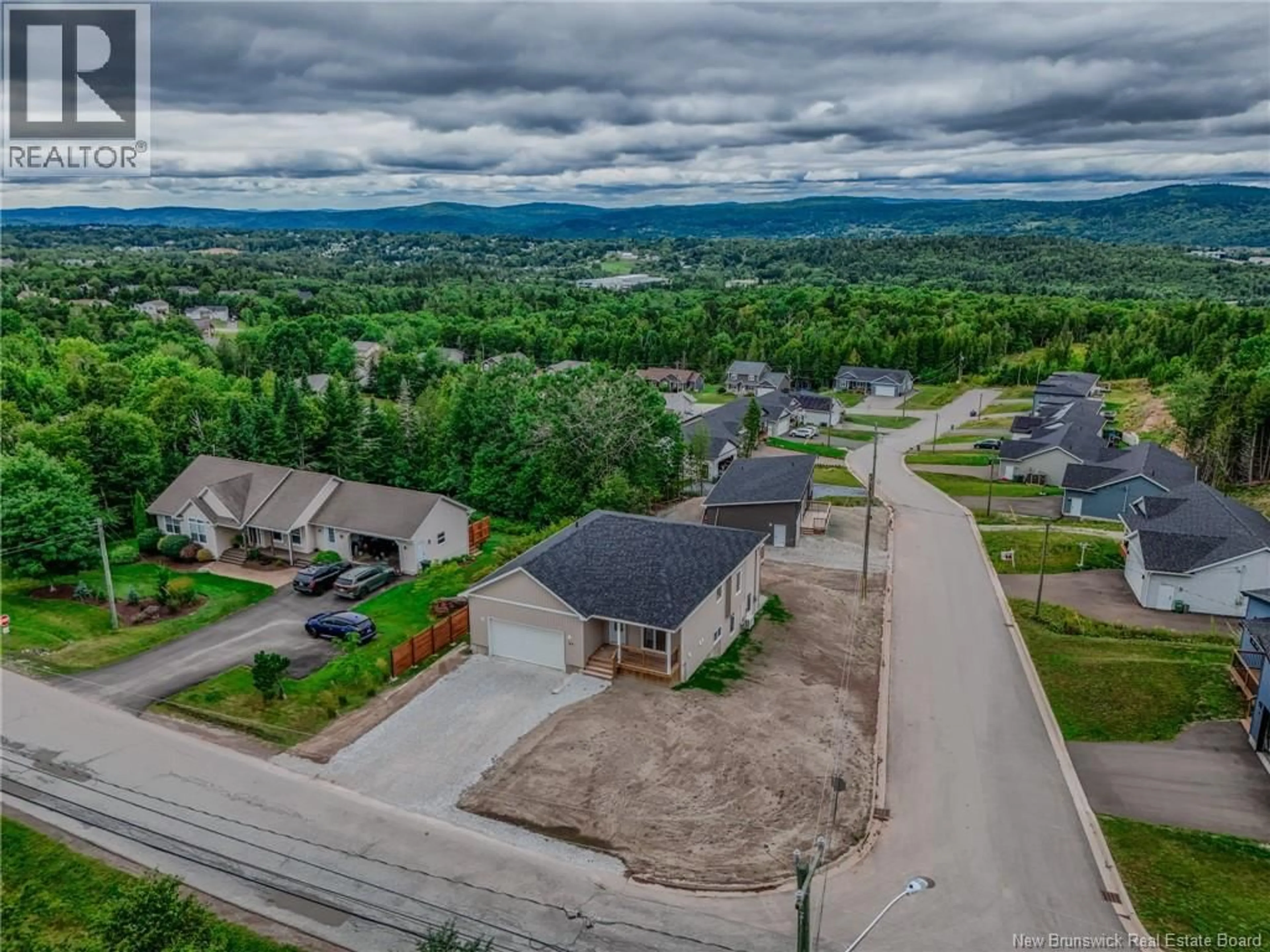 A pic from outside/outdoor area/front of a property/back of a property/a pic from drone, mountain view for 65 SQUIRE DRIVE, Quispamsis New Brunswick E2G1C1