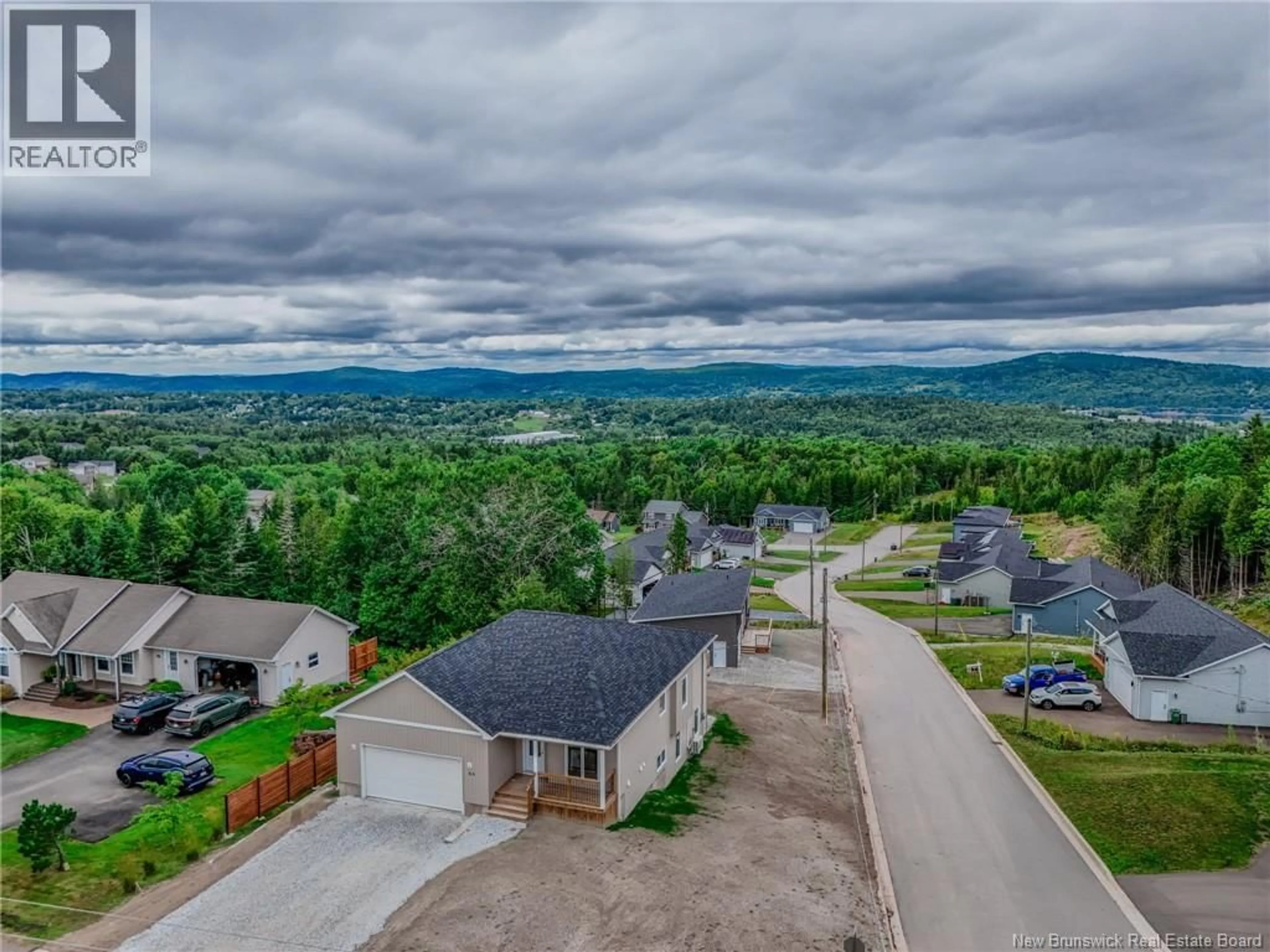A pic from outside/outdoor area/front of a property/back of a property/a pic from drone, mountain view for 65 SQUIRE DRIVE, Quispamsis New Brunswick E2G1C1