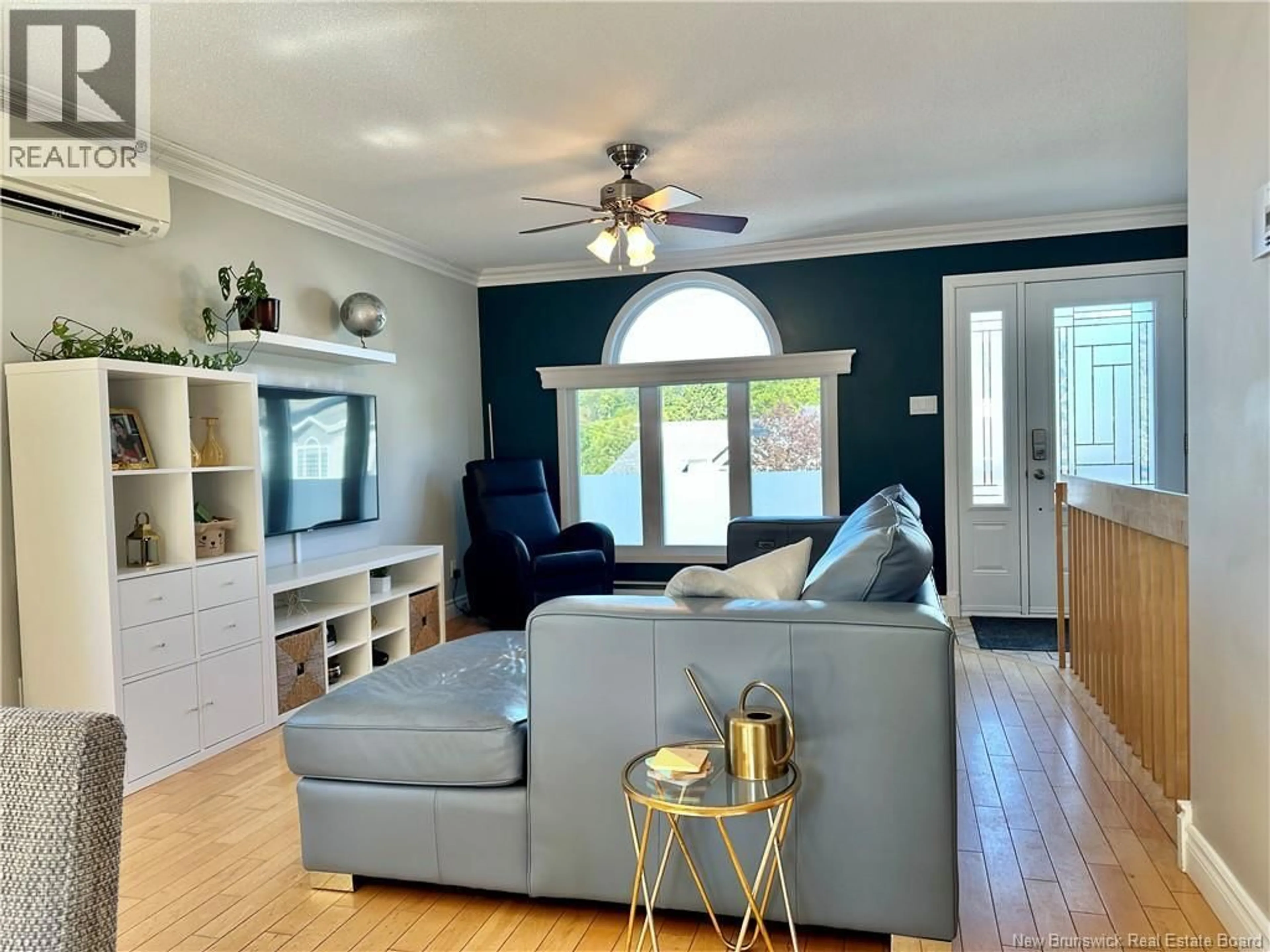 Living room with furniture, wood/laminate floor for 121 BELISLE AVENUE, Edmundston New Brunswick E3V4C7