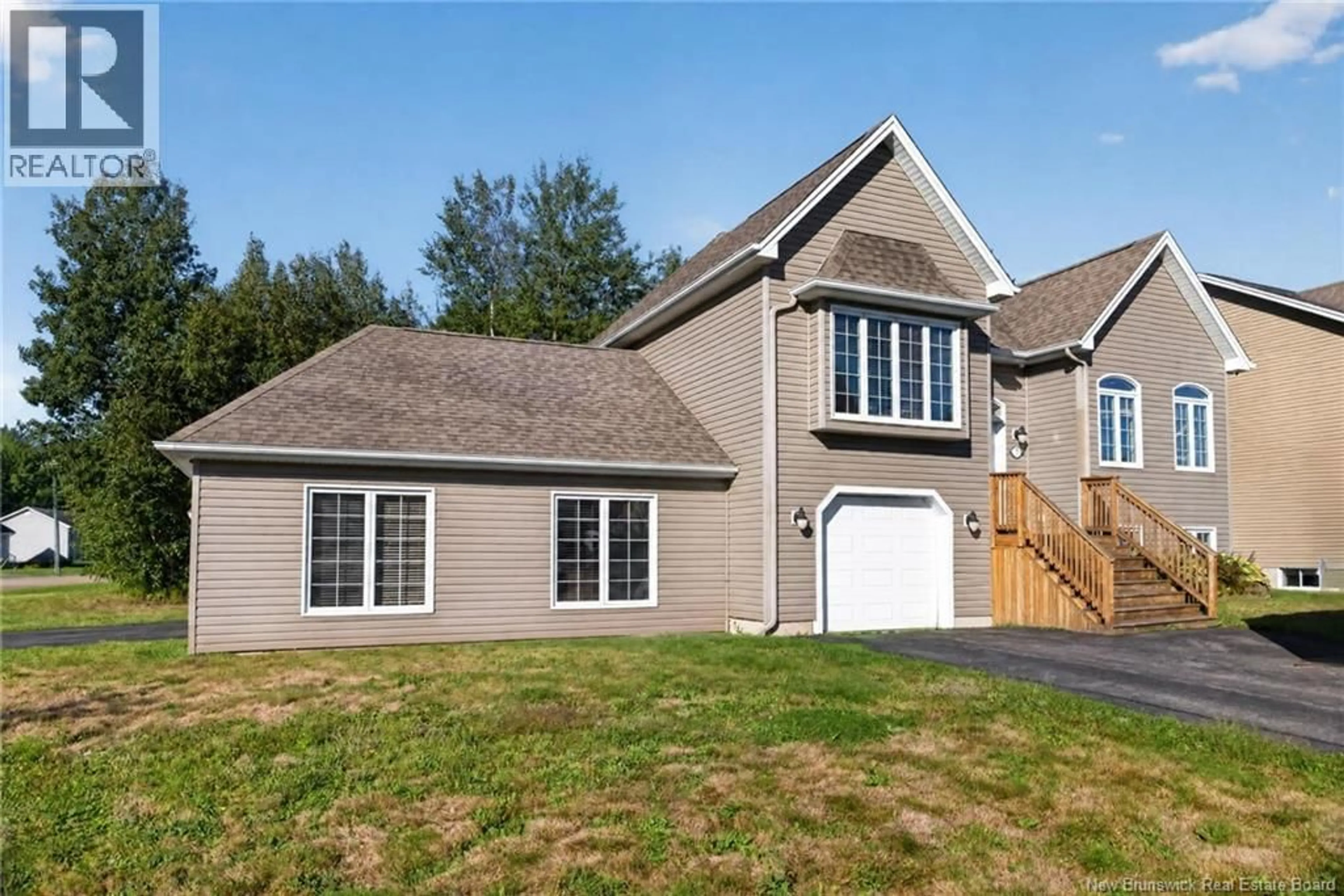 Home with vinyl exterior material, street for 72 BONAVENTURE, Dieppe New Brunswick E1A4S2
