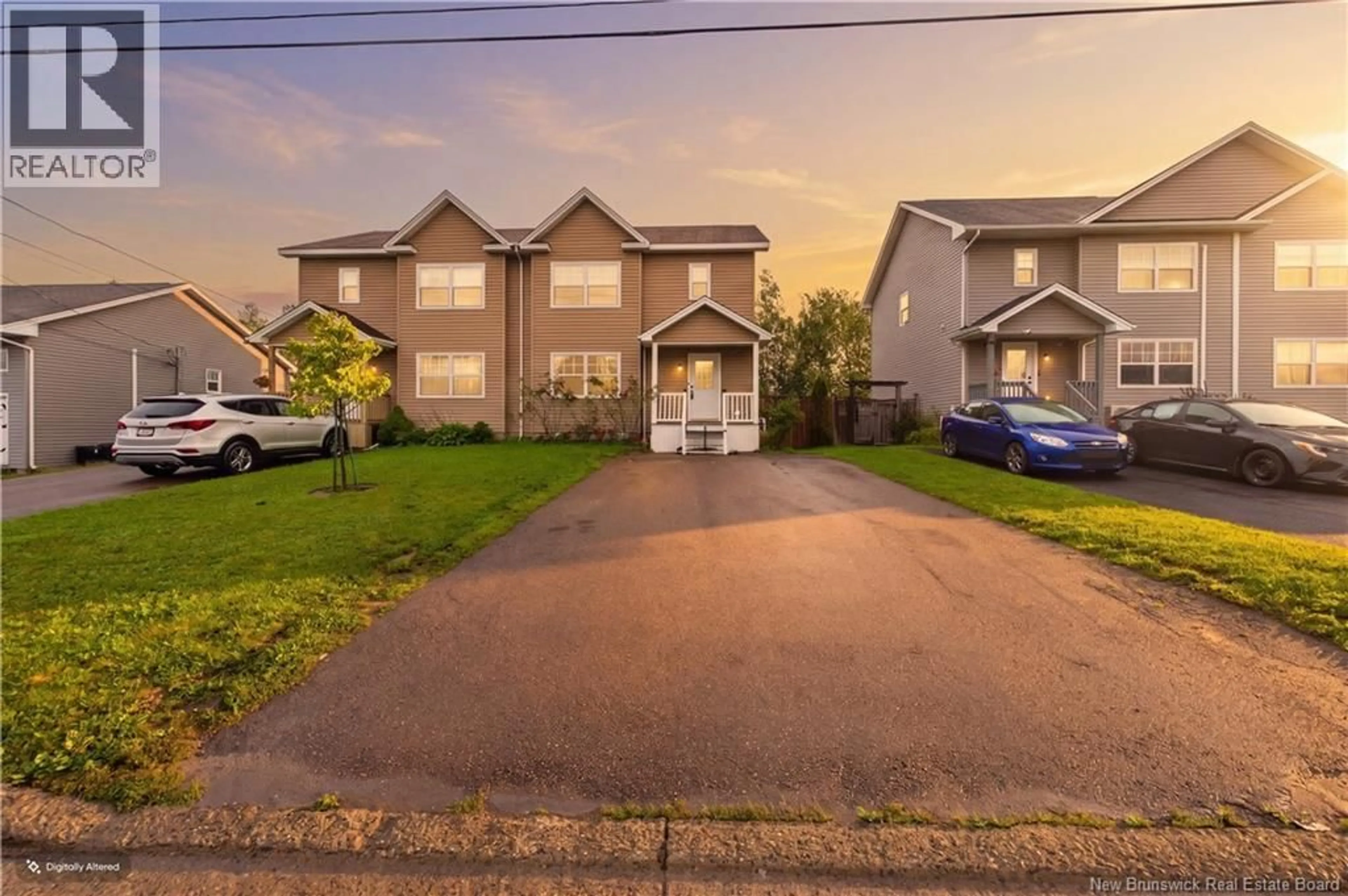 A pic from outside/outdoor area/front of a property/back of a property/a pic from drone, street for 54 WHISPERWOOD DRIVE, Moncton New Brunswick E1G0P8