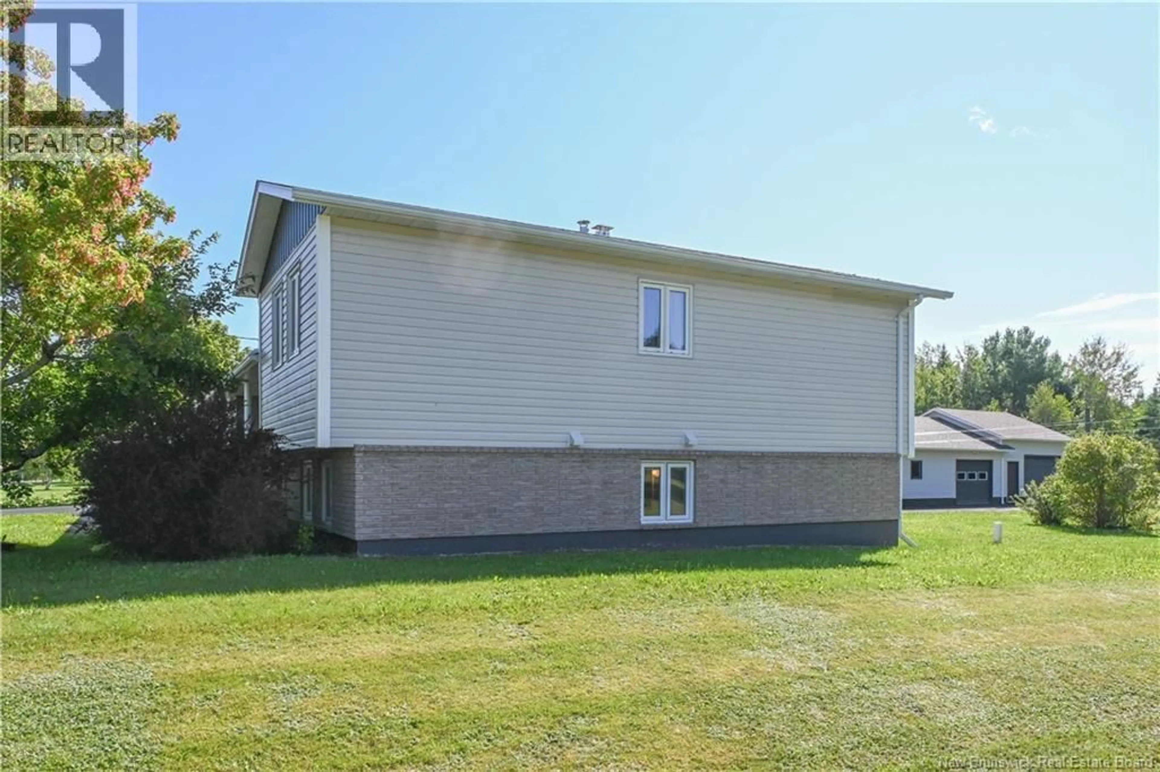 Home with vinyl exterior material, building for 411 RANG ST-GEORGES STREET, Rang-Saint-Georges New Brunswick E8R1L9