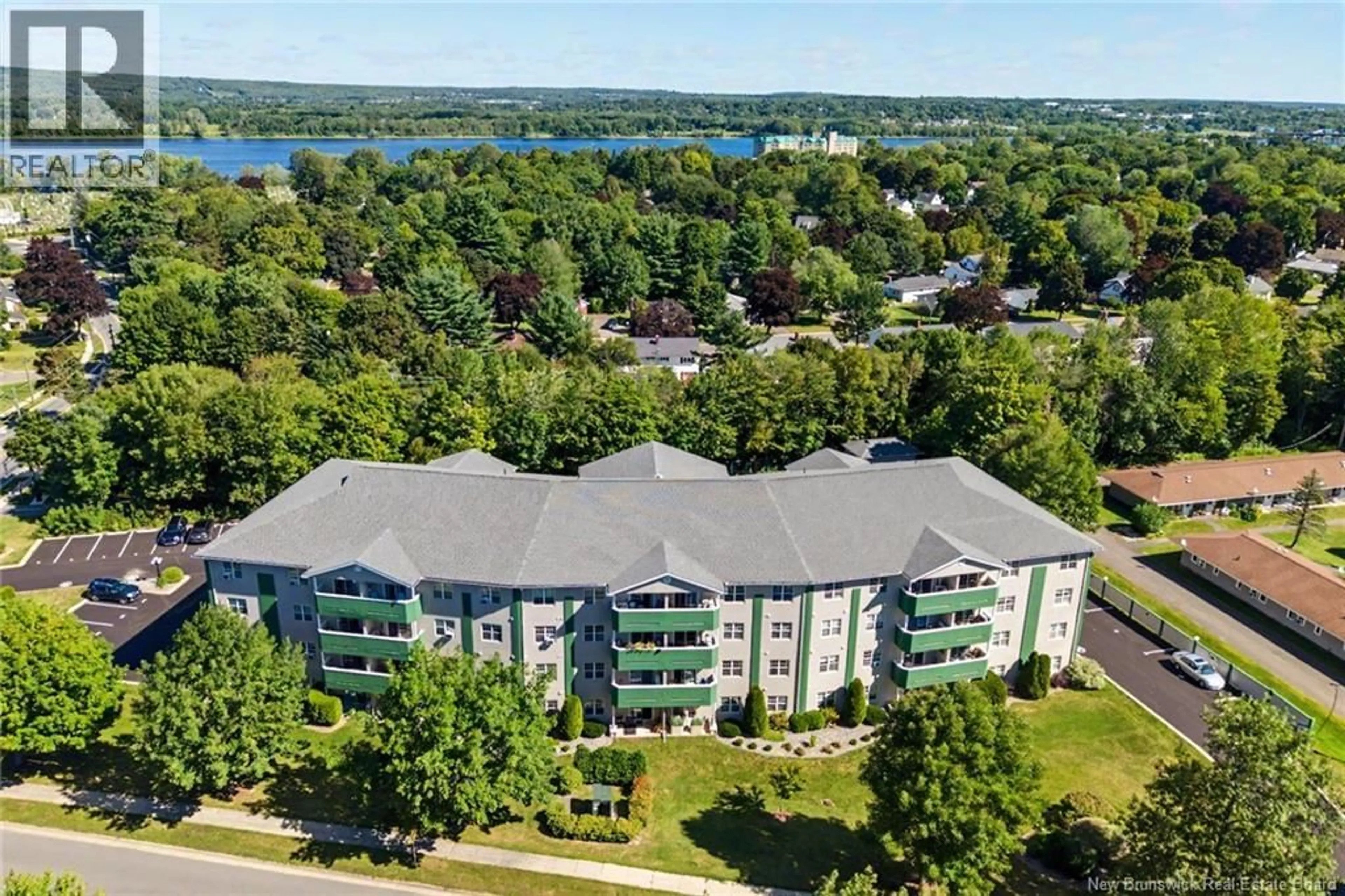 A pic from outside/outdoor area/front of a property/back of a property/a pic from drone, water/lake/river/ocean view for 203 - 158 HANWELL ROAD, Fredericton New Brunswick E3B9K7