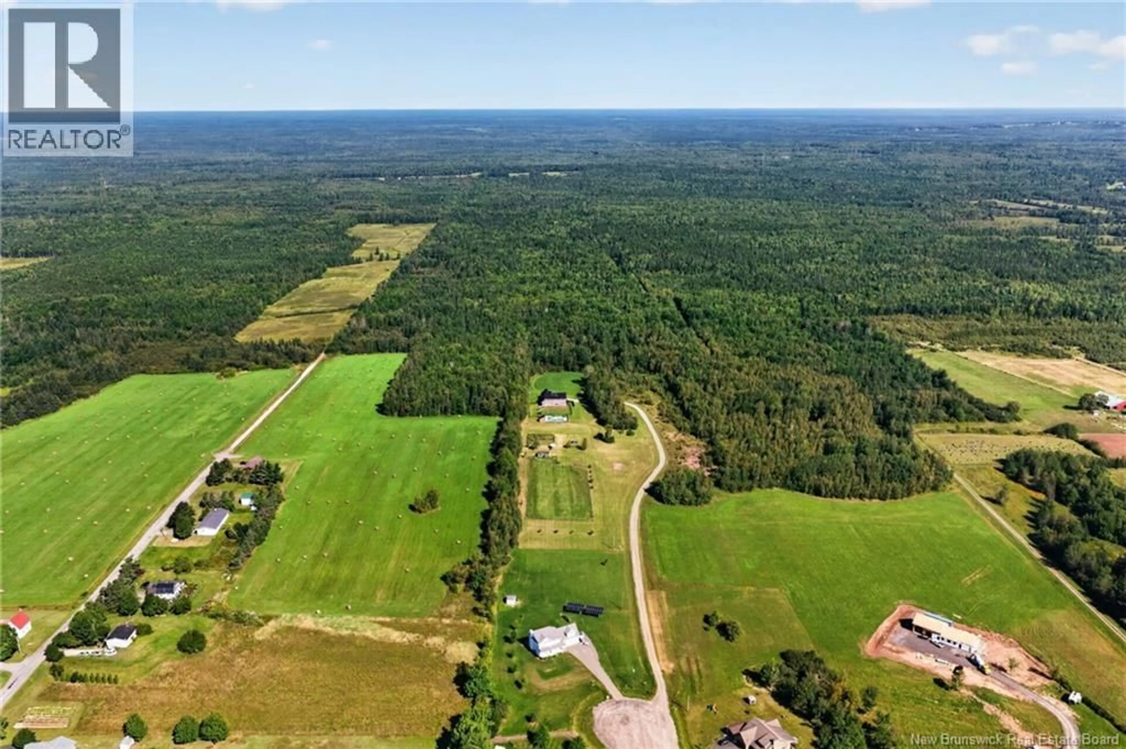 A pic from outside/outdoor area/front of a property/back of a property/a pic from drone, forest/trees view for 32 GARY ROAD, Steeves Mountain New Brunswick E1G0N6