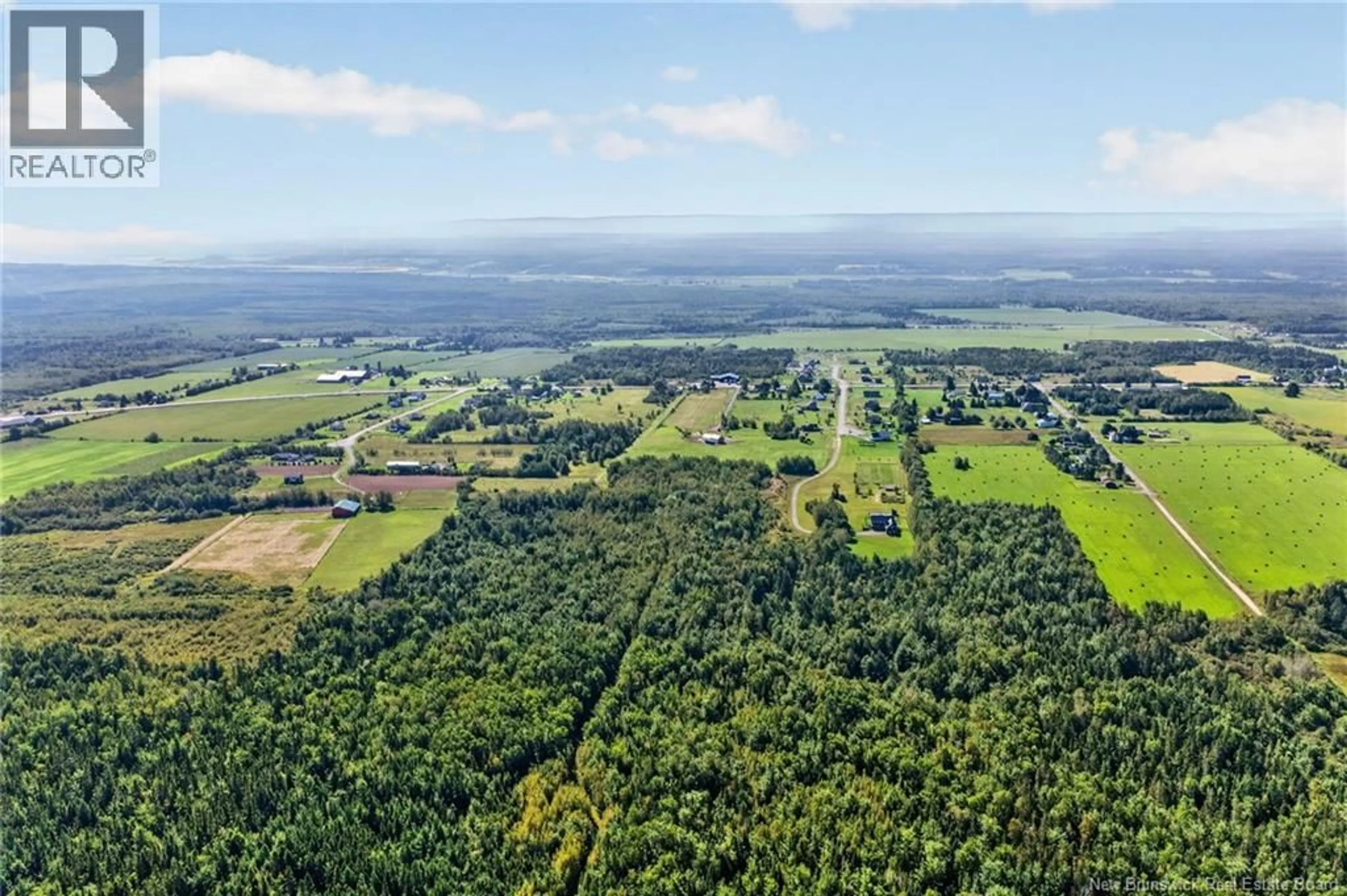 A pic from outside/outdoor area/front of a property/back of a property/a pic from drone, forest/trees view for 32 GARY ROAD, Steeves Mountain New Brunswick E1G0N6