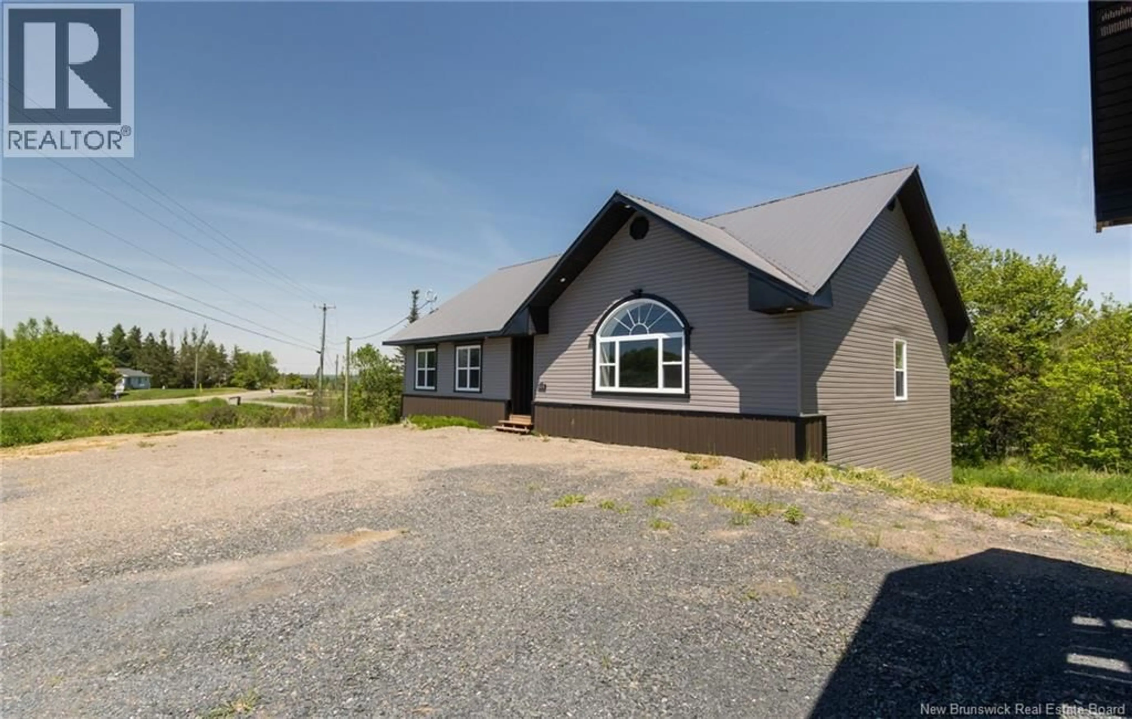 A pic from outside/outdoor area/front of a property/back of a property/a pic from drone, building for 173 ROUTE 3, New Market New Brunswick E6K2W3