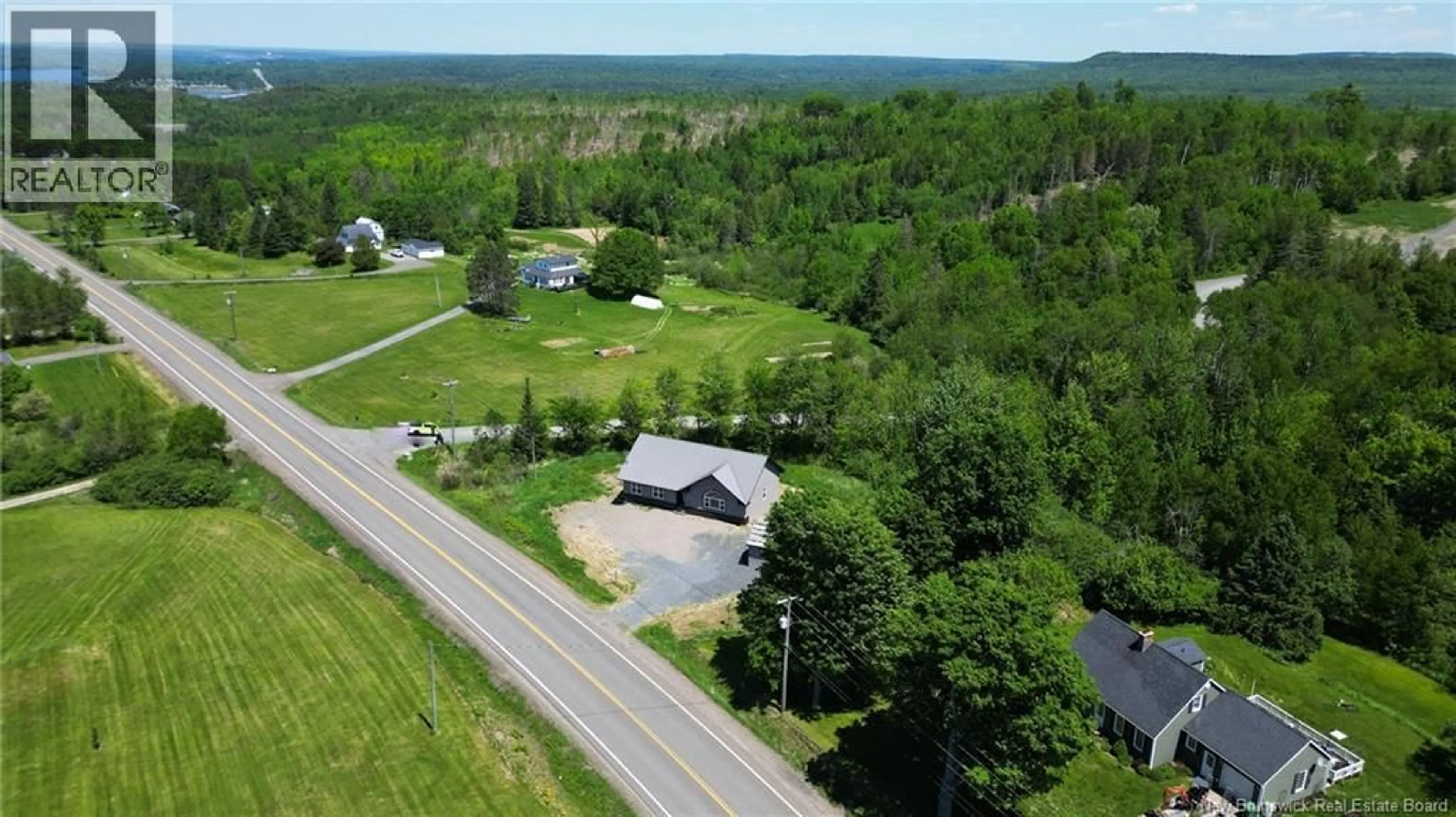 A pic from outside/outdoor area/front of a property/back of a property/a pic from drone, mountain view for 173 ROUTE 3, New Market New Brunswick E6K2W3