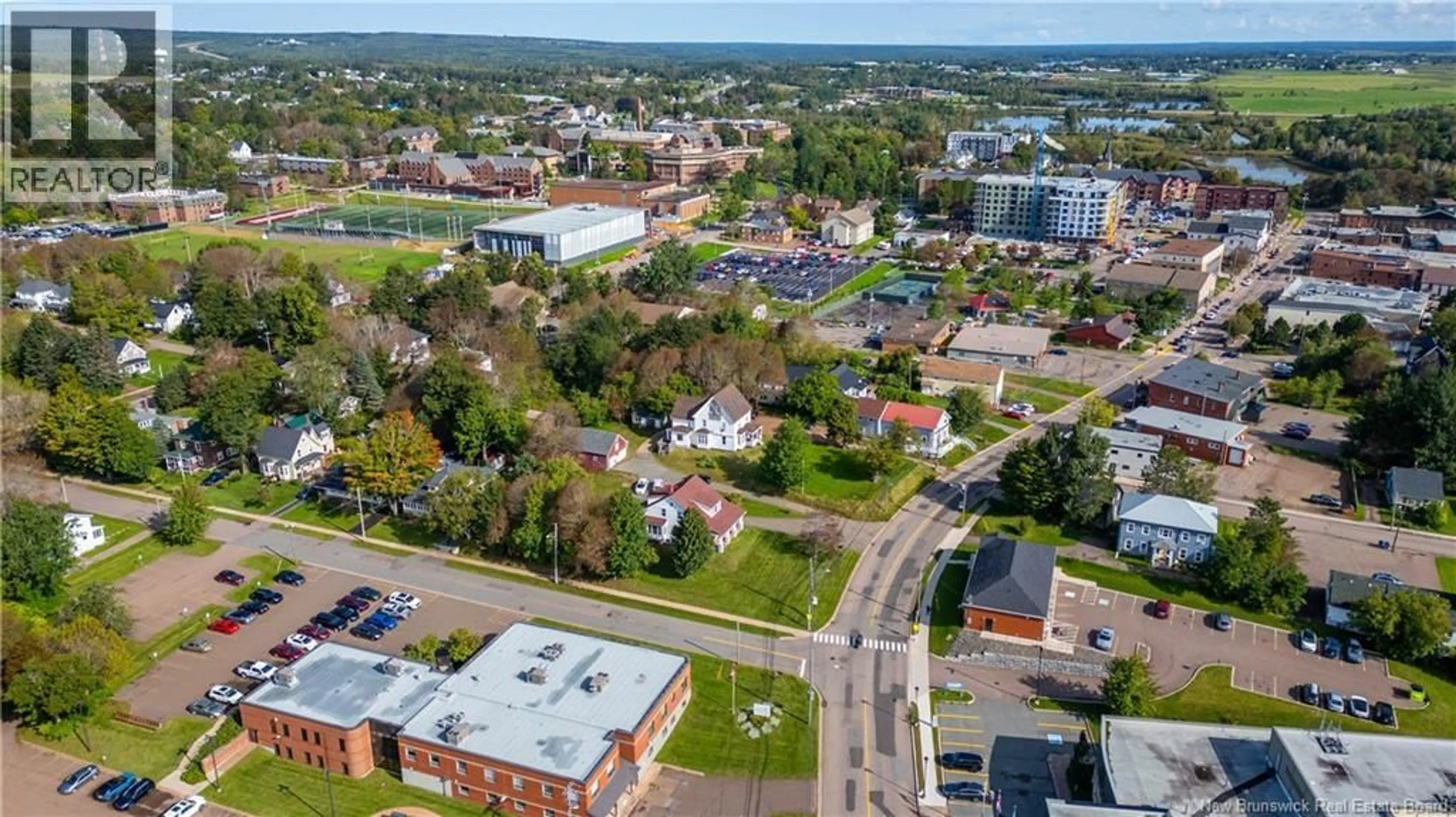 A pic from outside/outdoor area/front of a property/back of a property/a pic from drone, unknown for 36 MAIN STREET, Sackville New Brunswick E4L4A7