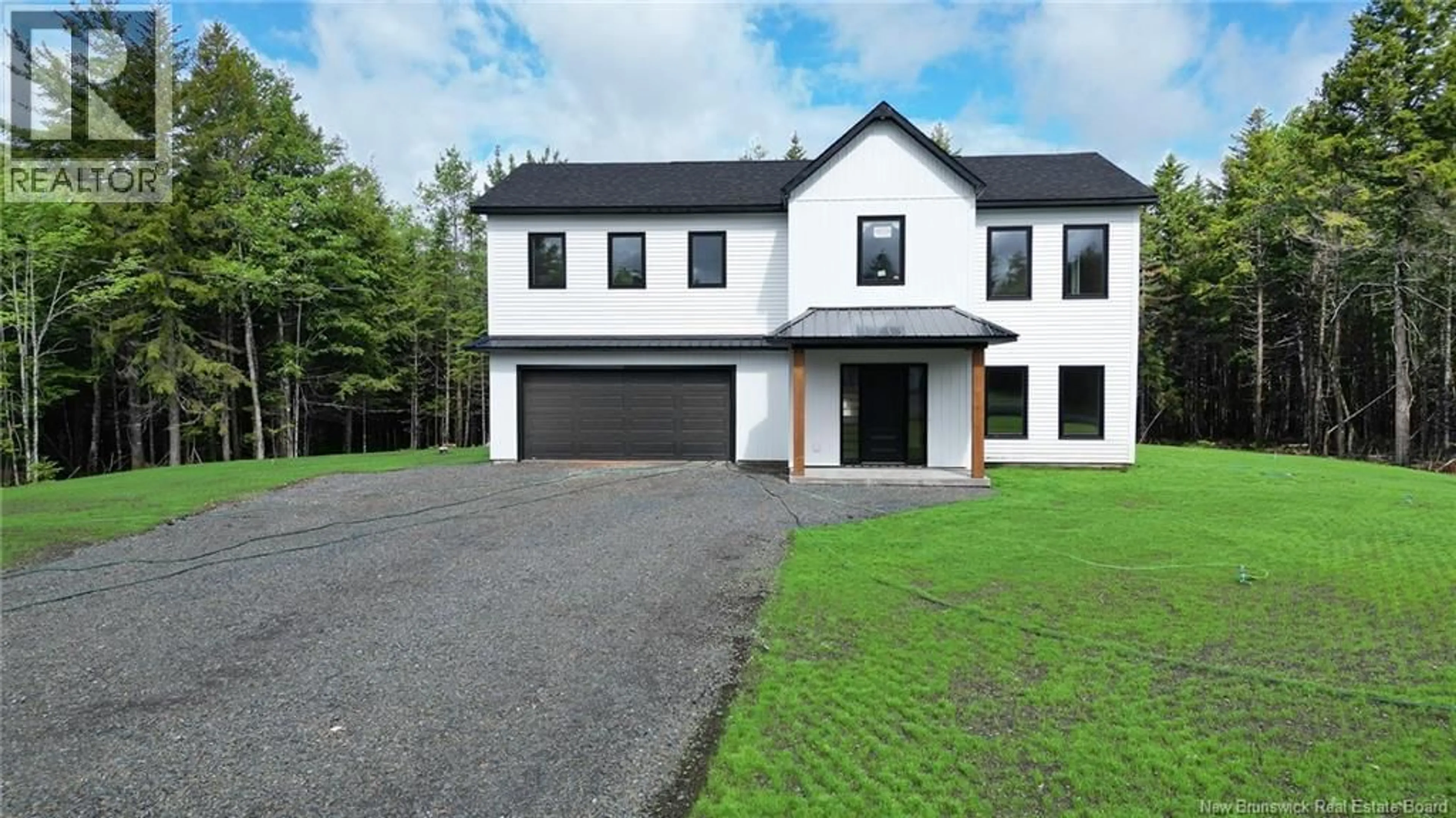 A pic from outside/outdoor area/front of a property/back of a property/a pic from drone, street for 61 SANDLEWOOD LANE, Douglas New Brunswick E3G0E7