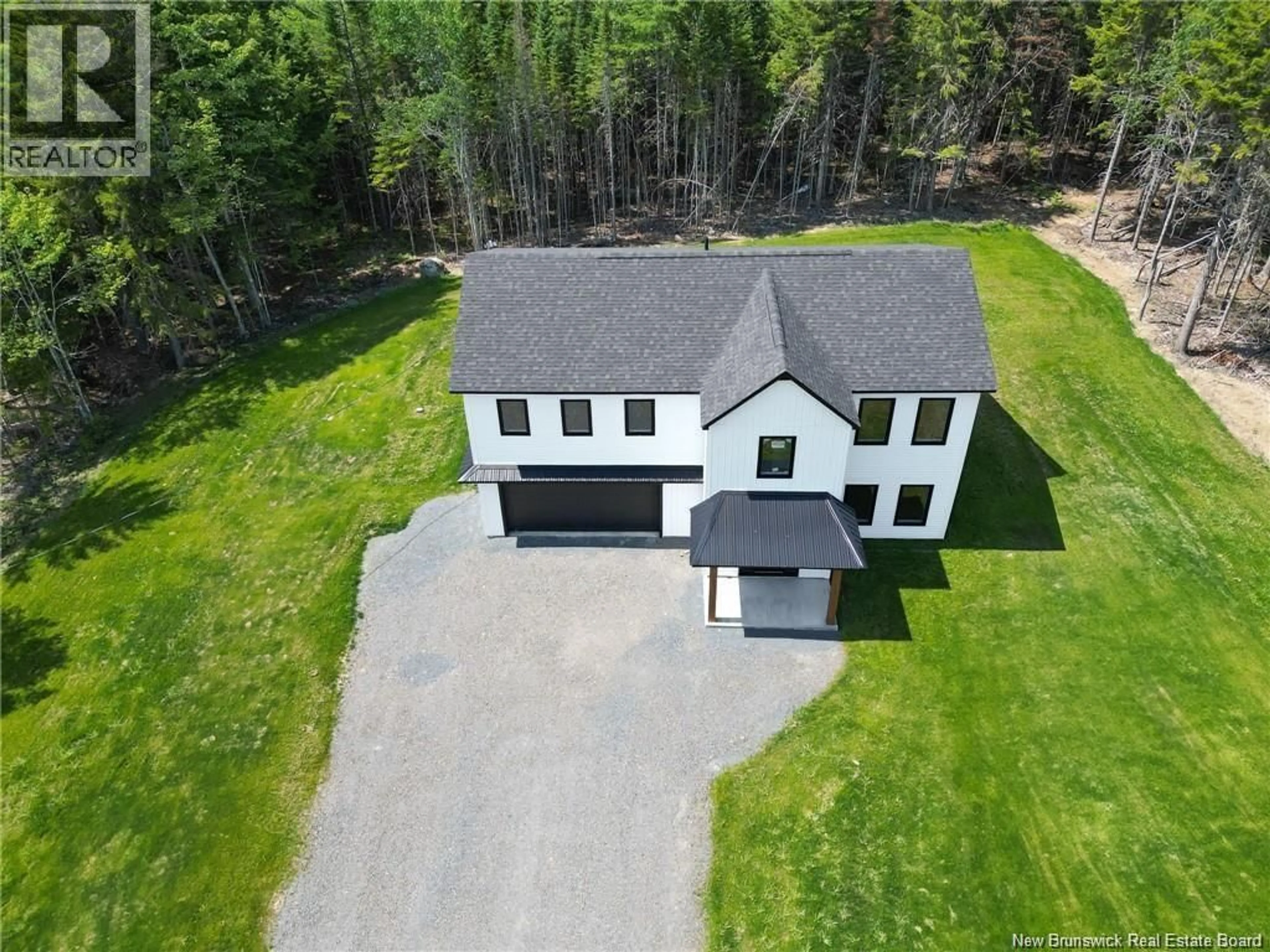 A pic from outside/outdoor area/front of a property/back of a property/a pic from drone, unknown for 61 SANDLEWOOD LANE, Douglas New Brunswick E3G0E7