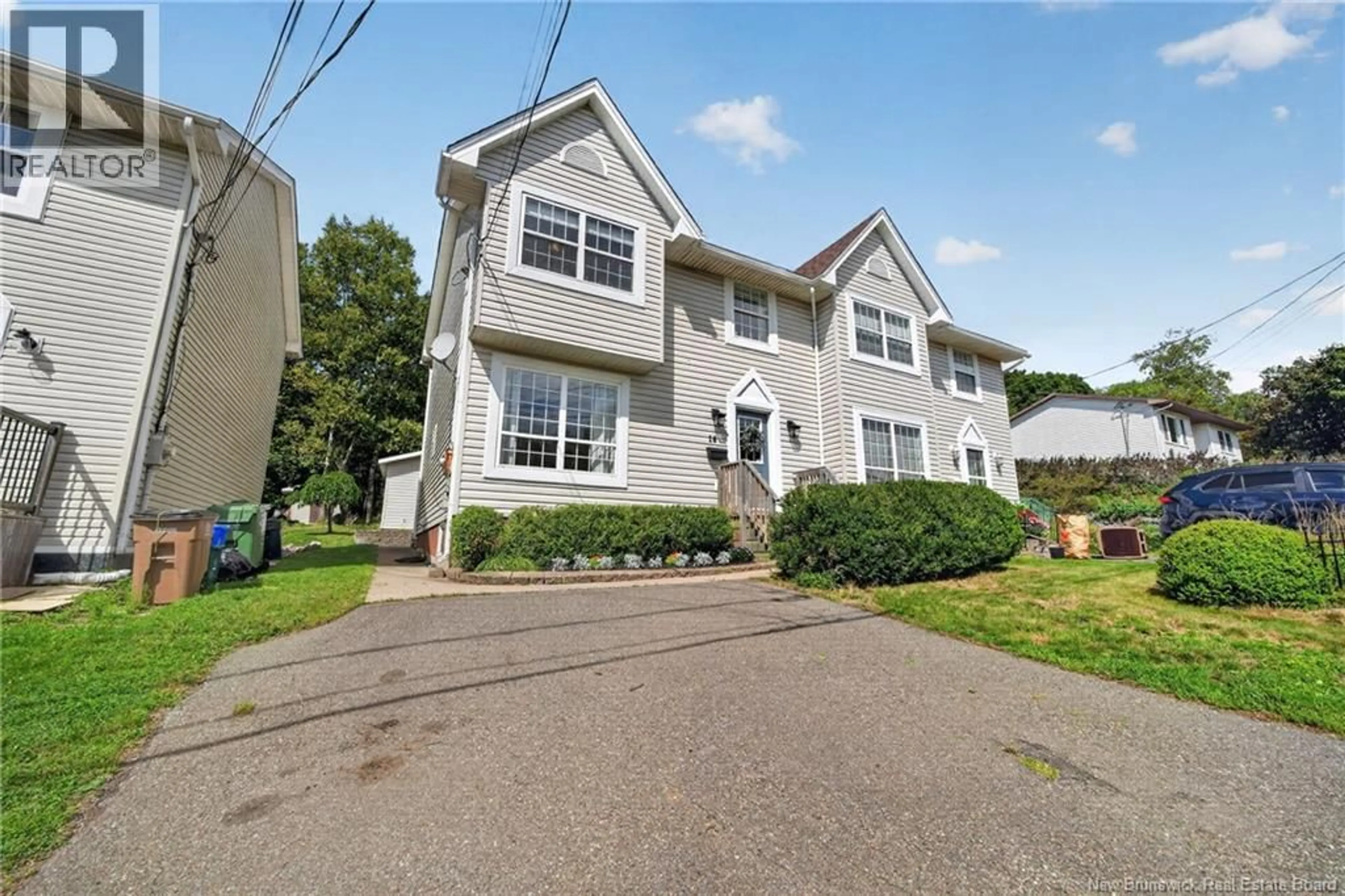 Home with vinyl exterior material, street for 16 PARKWOOD AVENUE, Saint John New Brunswick E2K5L8