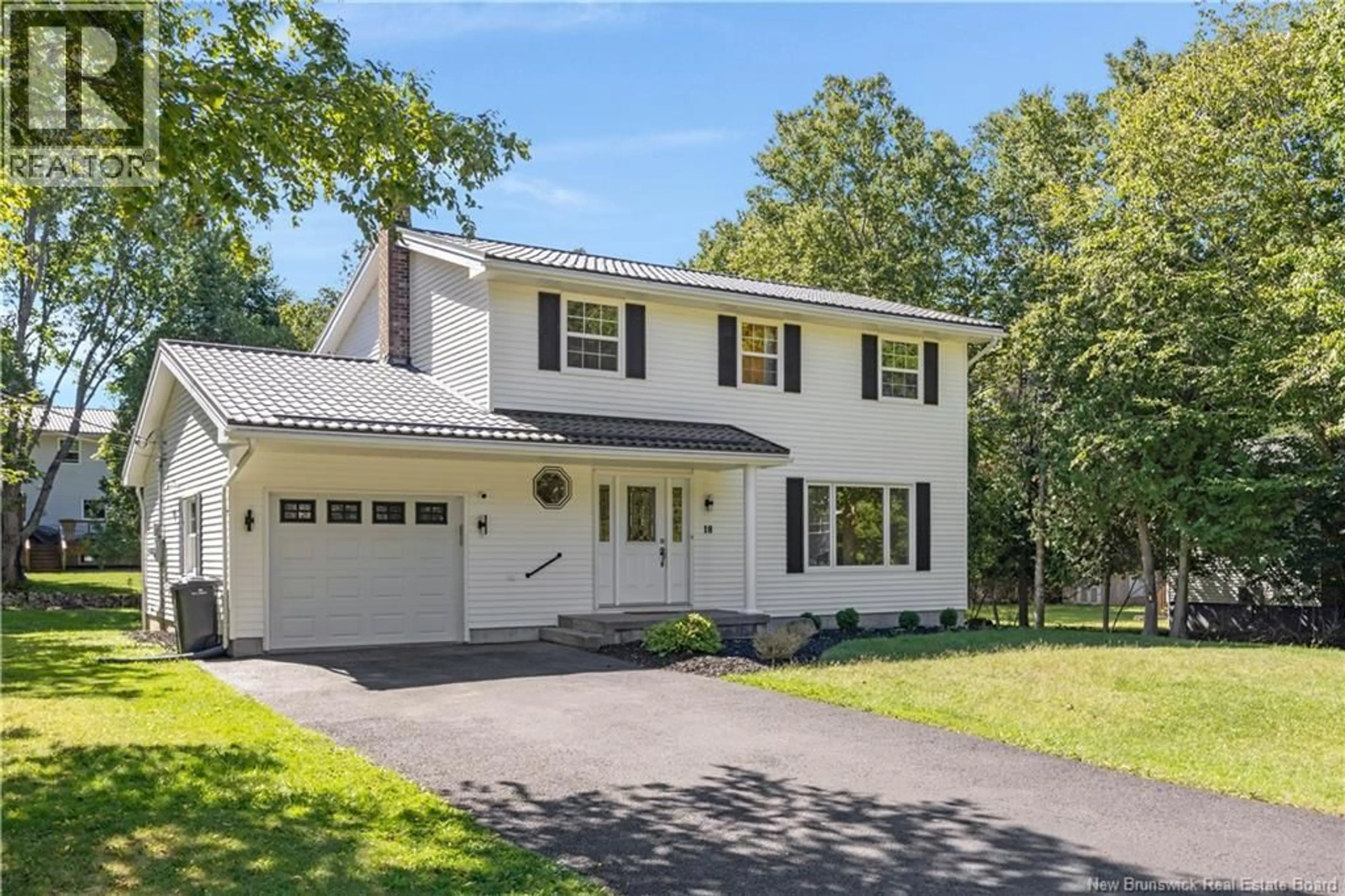 Home with vinyl exterior material, street for 18 DELMAR CRESCENT, Quispamsis New Brunswick E2E4J1