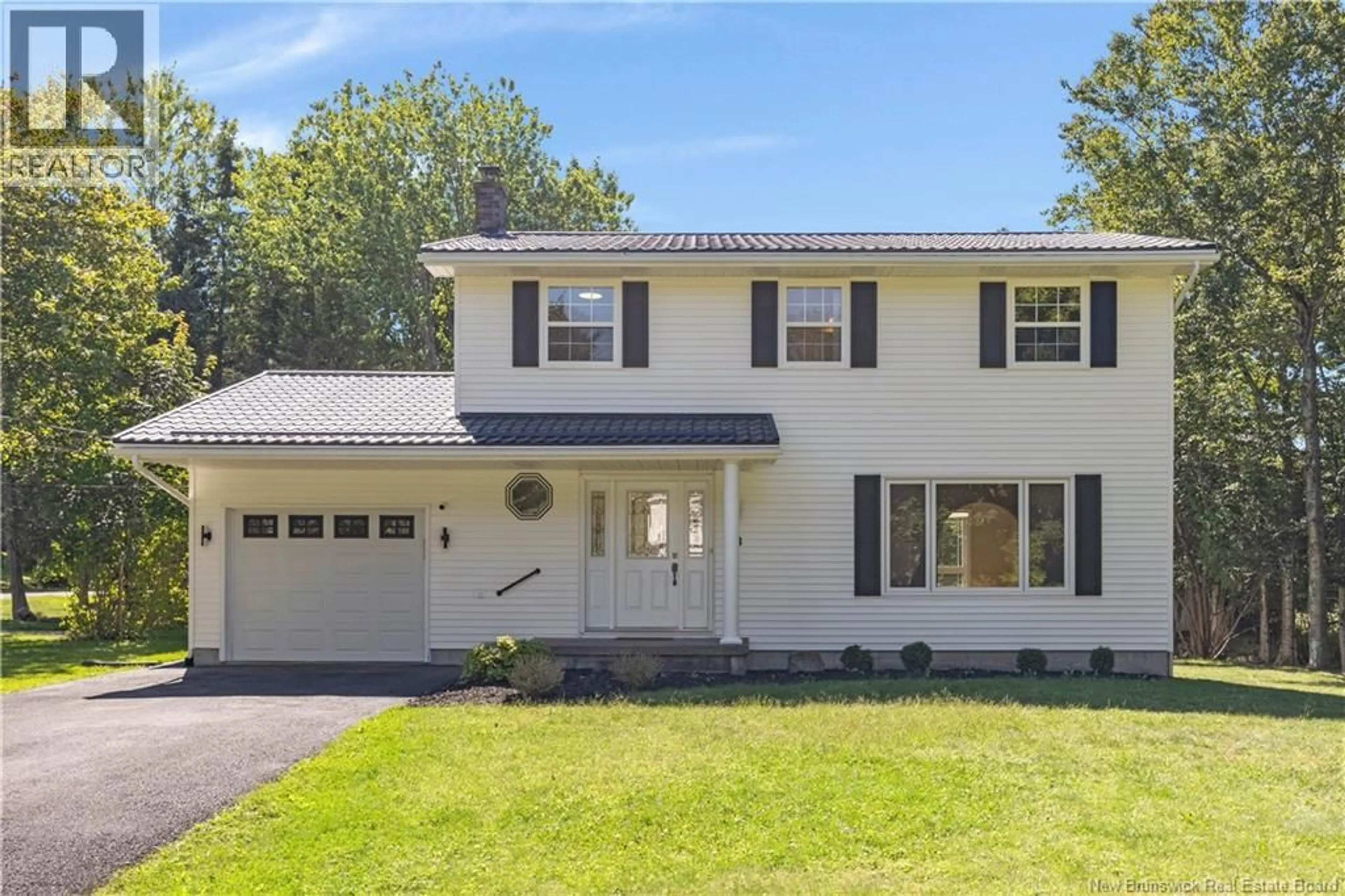 Home with vinyl exterior material, street for 18 DELMAR CRESCENT, Quispamsis New Brunswick E2E4J1