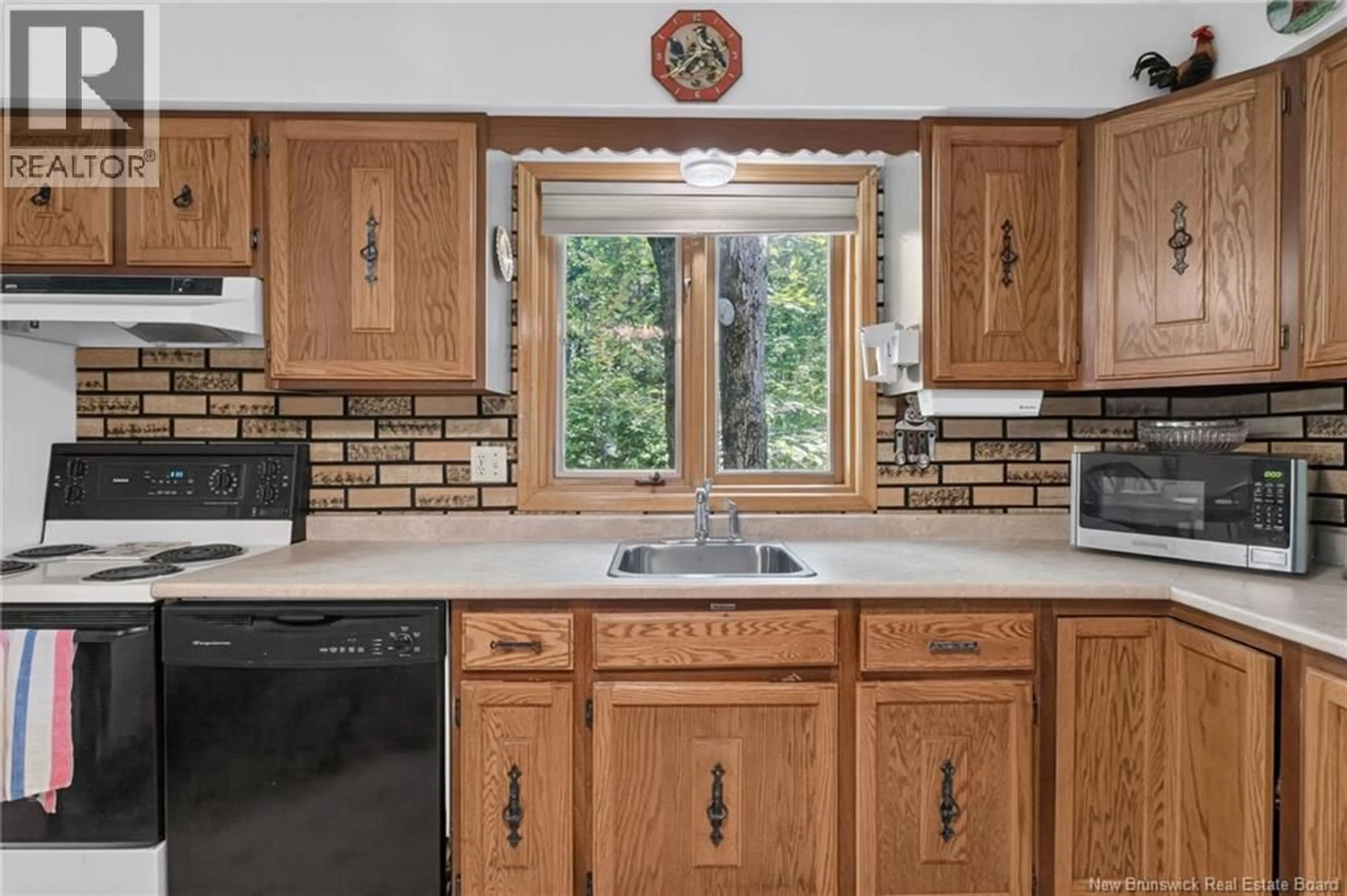 Standard kitchen, ceramic/tile floor for 27 SNOWDON COURT, Moncton New Brunswick E1G1P1