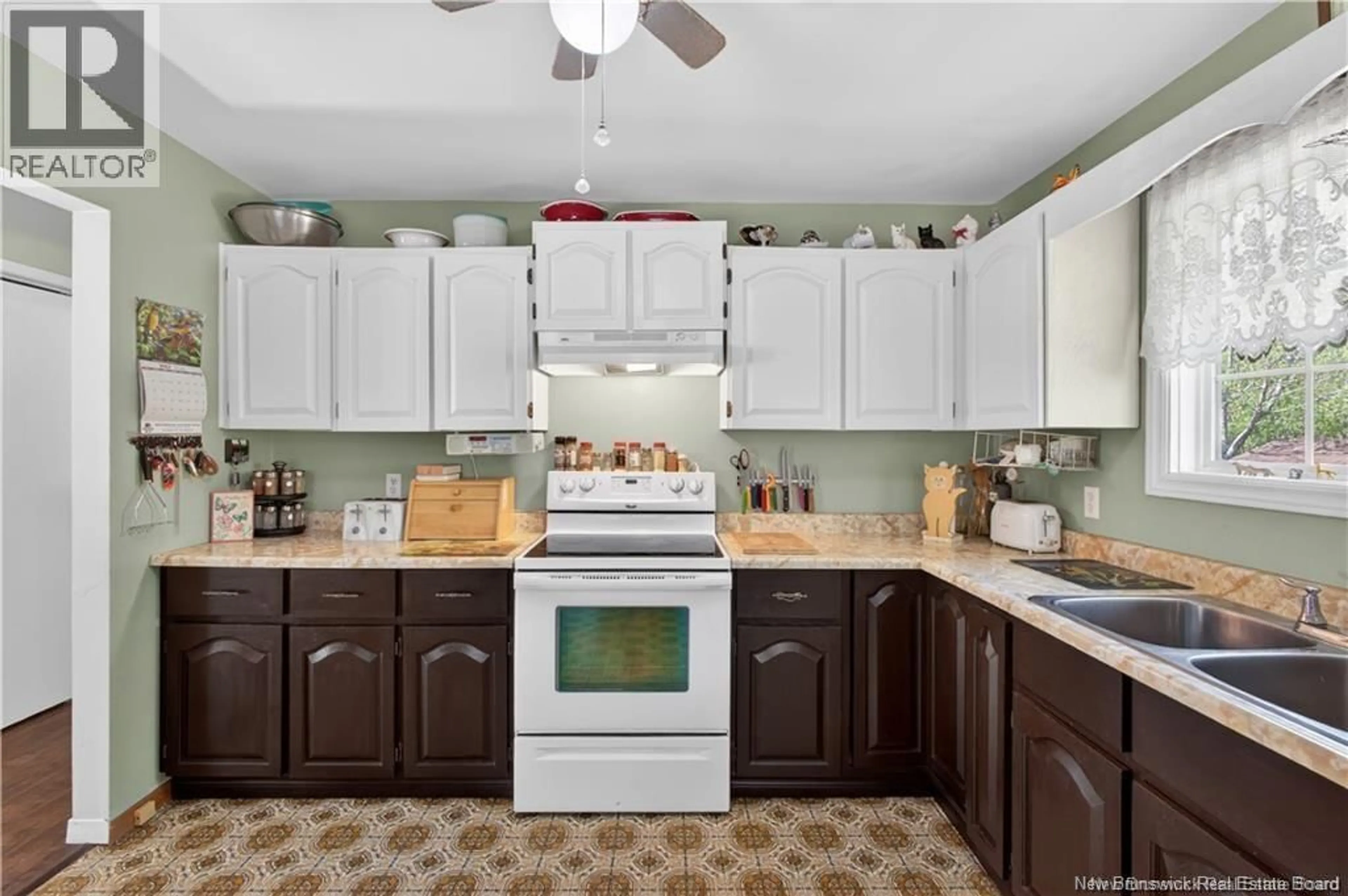Open concept kitchen, ceramic/tile floor for 20 ADAMS AVENUE, Miramichi New Brunswick E1V2W3
