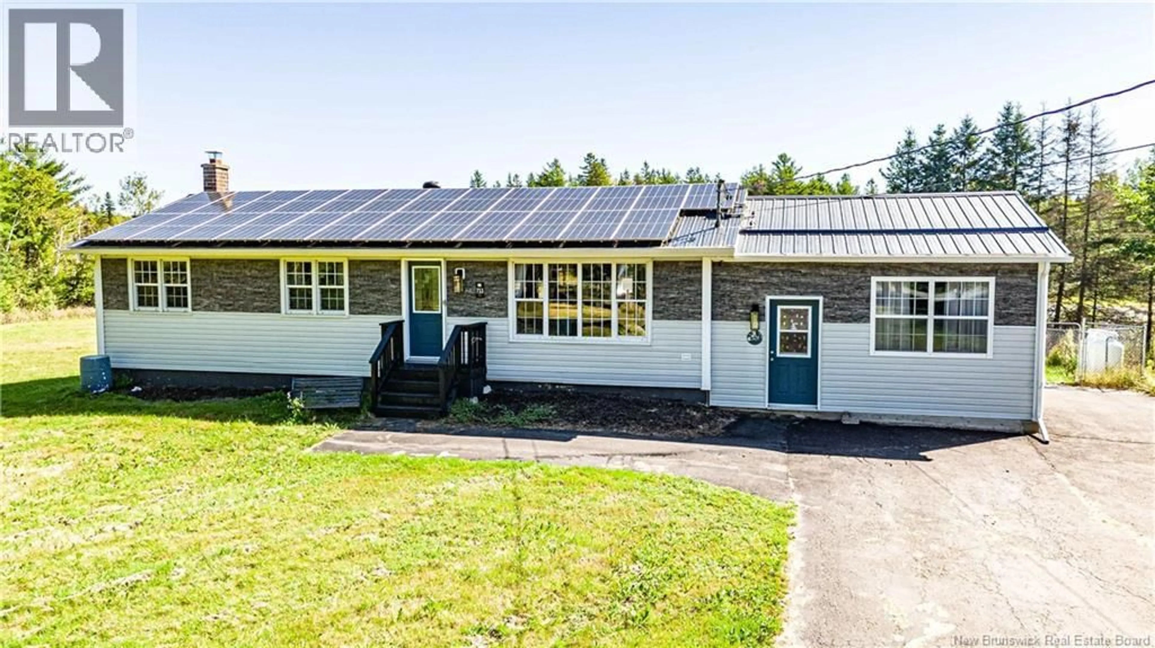 A pic from outside/outdoor area/front of a property/back of a property/a pic from drone, building for 711 MAIN STREET, Chipman New Brunswick E4A2R6
