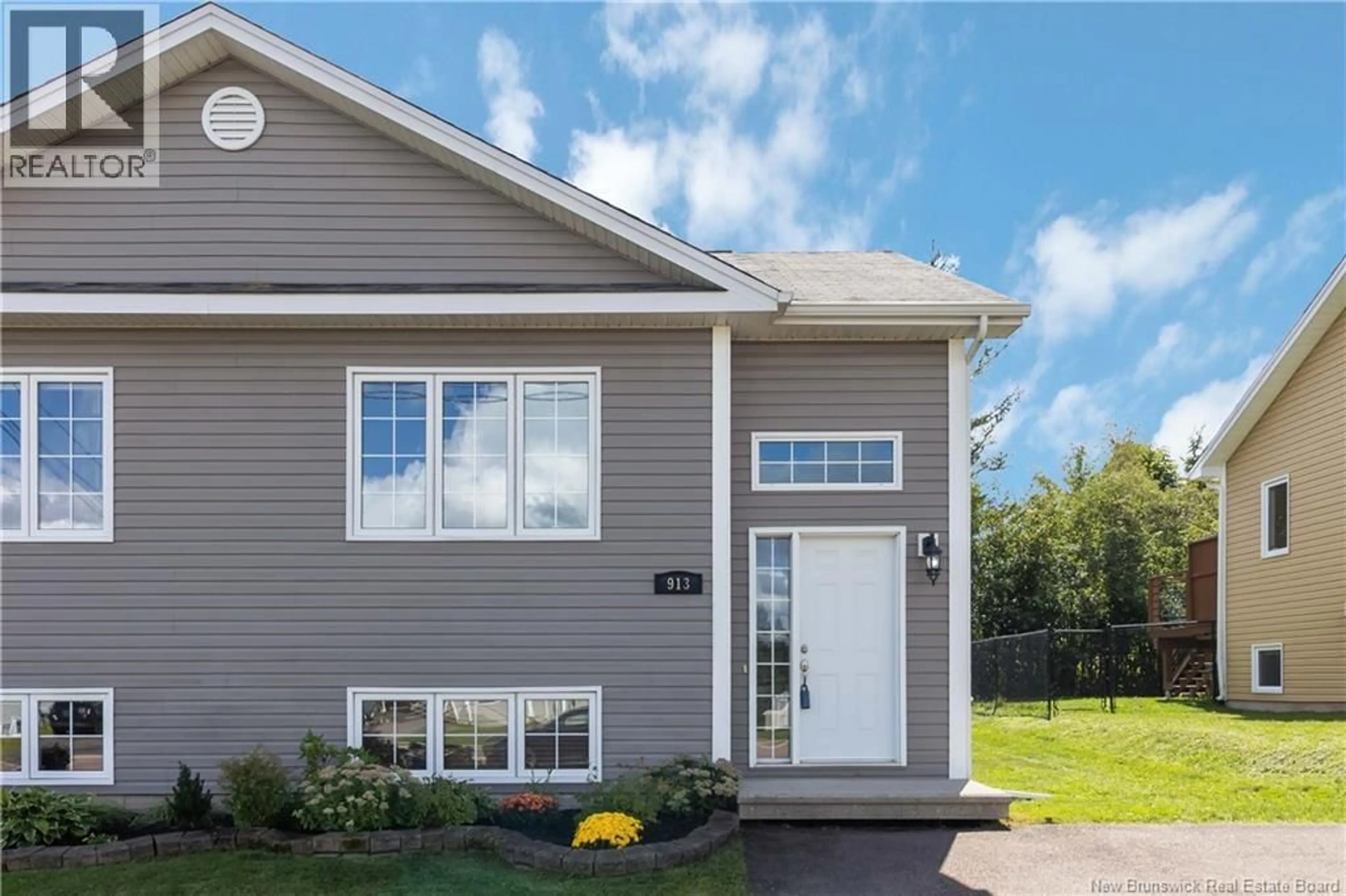 Home with vinyl exterior material, street for 913 BERNARD STREET, Dieppe New Brunswick E1A4A6